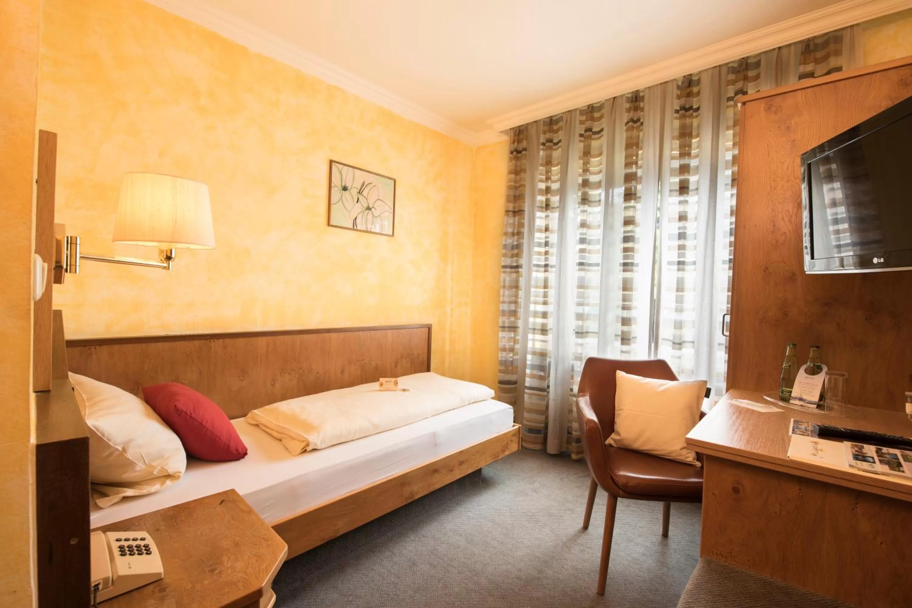 Photo of the whole room, Bed in AKZENT Hotel Krone