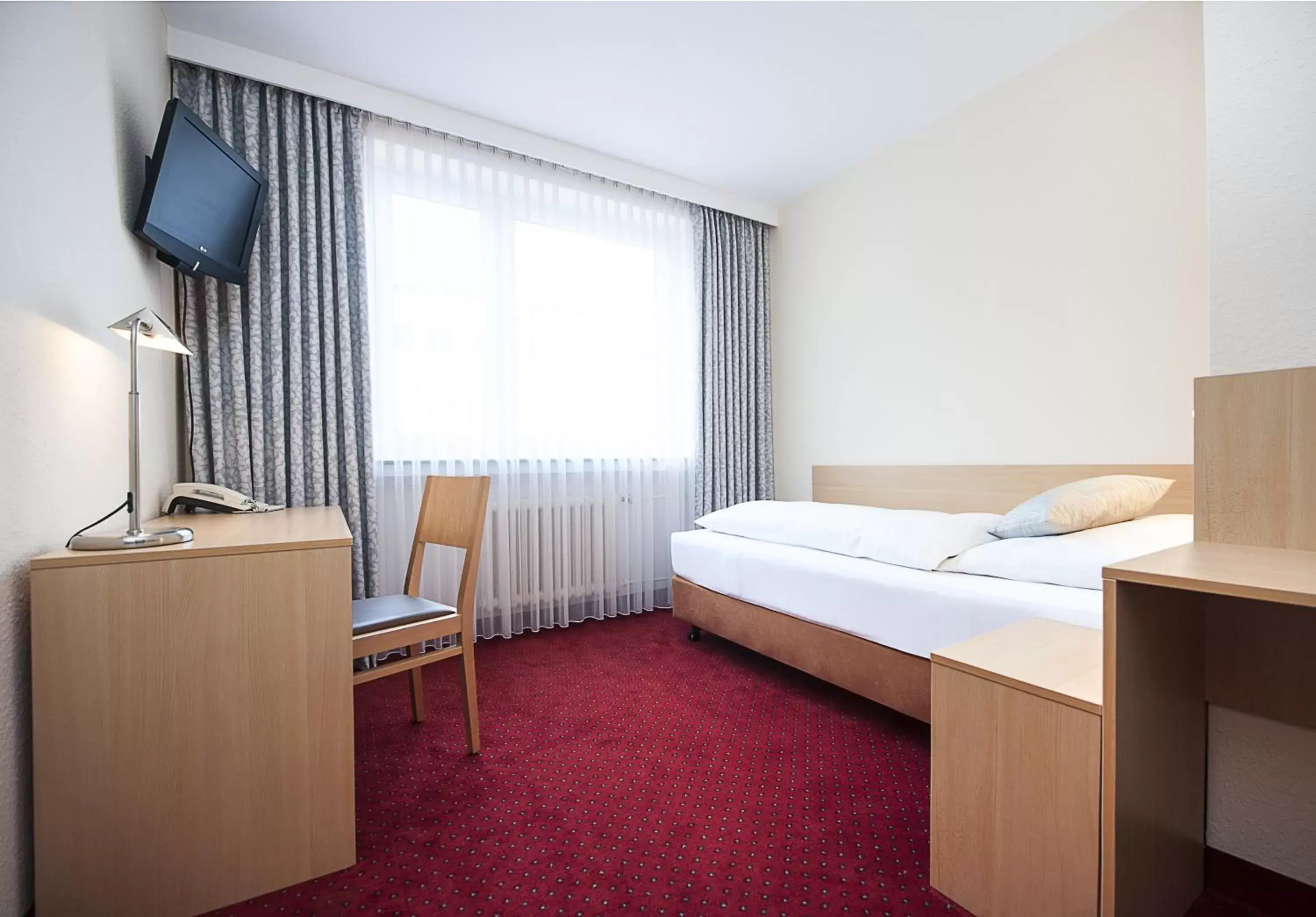 Standard Single Room in Comfort Garni Stadtzentrum Hotel Standard Single Room in Comfort Garni Stadtzentrum Hotel