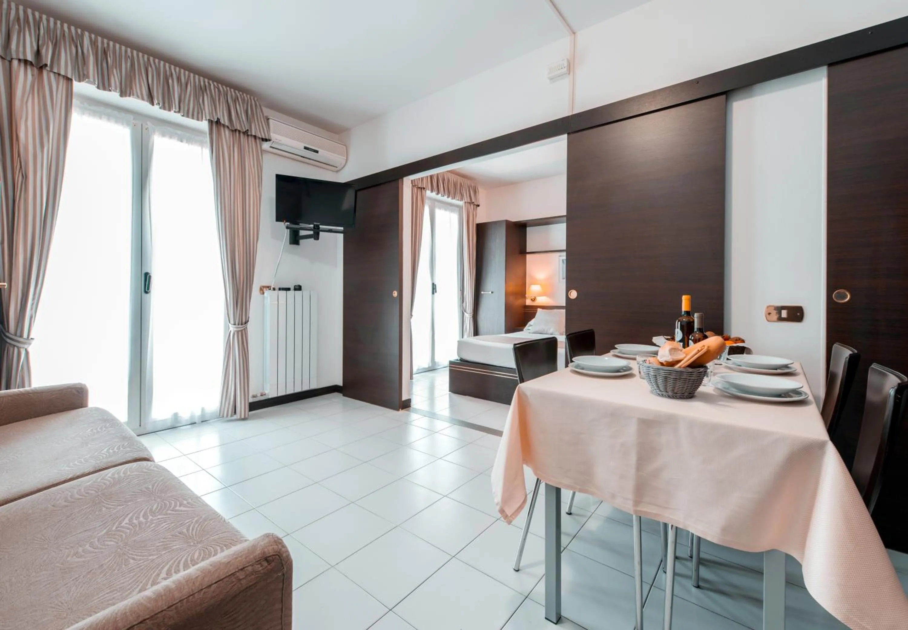 Seating area in Loano 2 Village