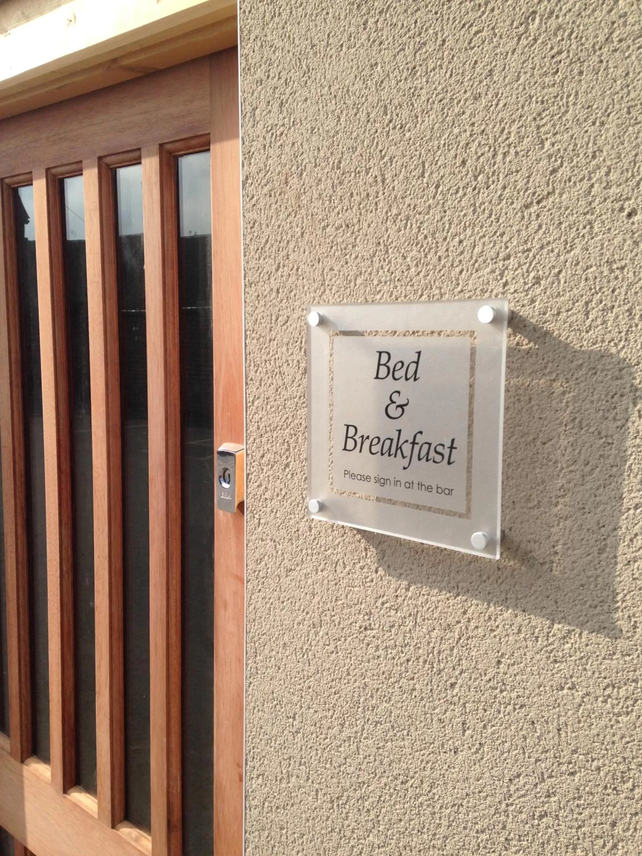 Property logo or sign in The Wheatsheaf