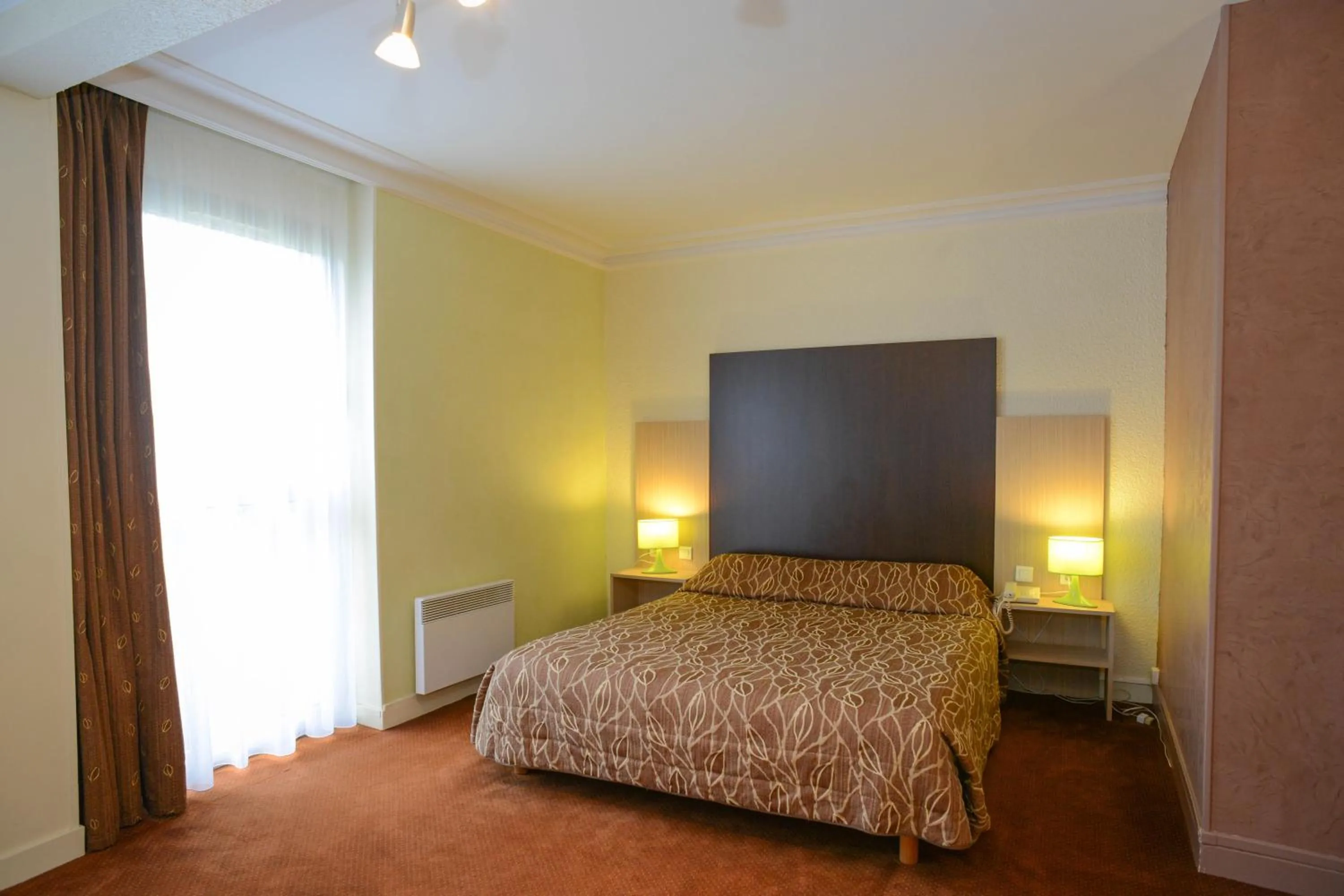 Photo of the whole room, Bed in Hôtel Cositel, CIT'HOTEL Coutances