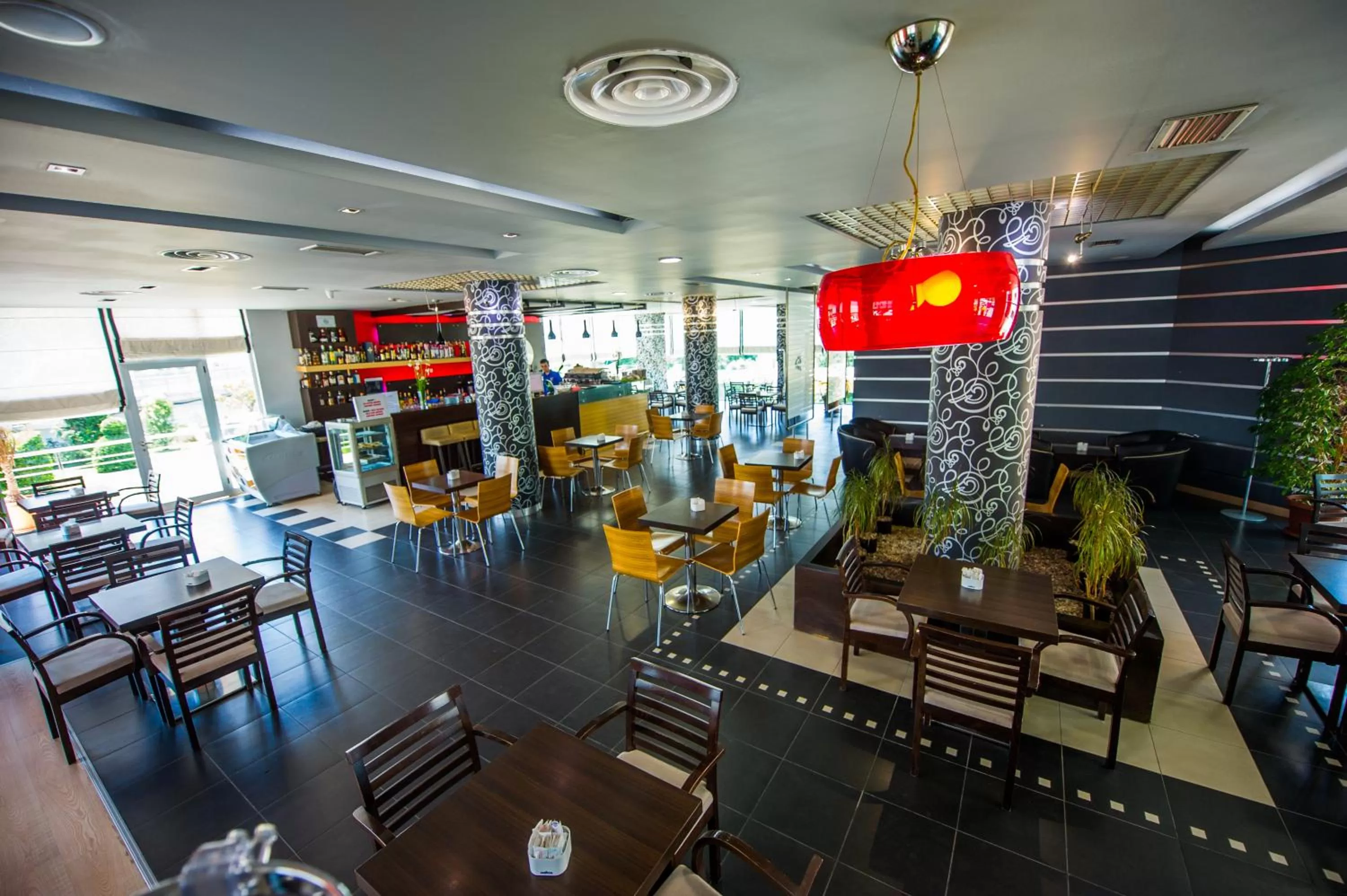 Lounge or bar, Restaurant/Places to Eat in Luani A Hotel