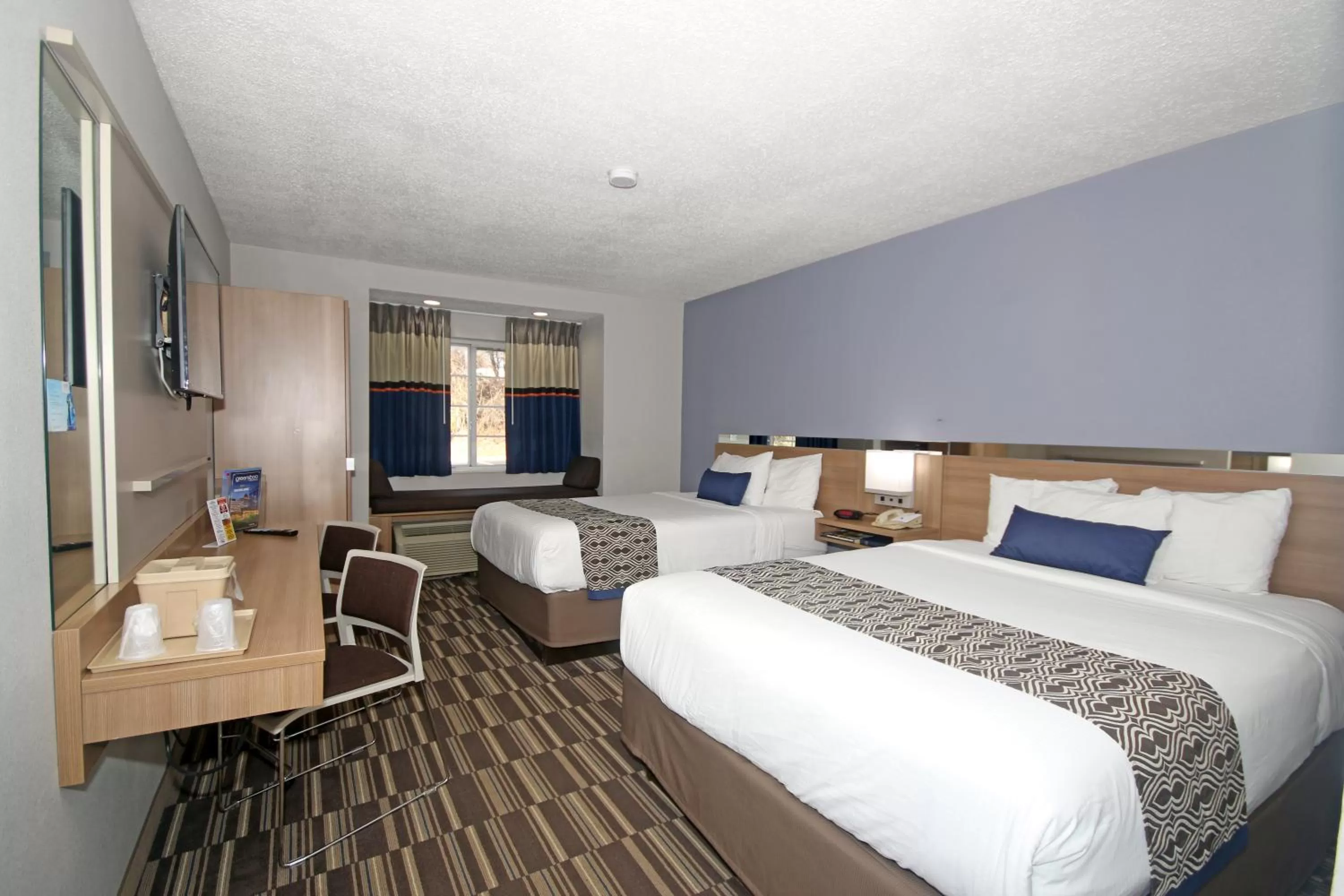 Photo of the whole room, Bed in Microtel Inn by Wyndham Greensboro
