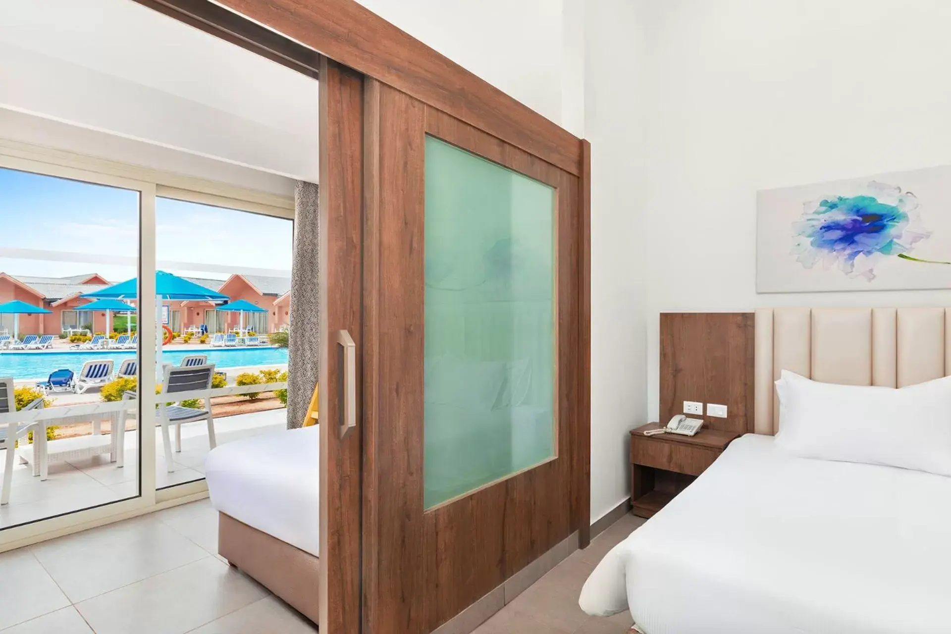 Bungalow Triple Room with Pool View in Pickalbatros Jungle Aqua Park - Neverland Hurghada Bungalow Triple Room with Pool View in Pickalbatros Jungle Aqua Park - Neverland Hurghada