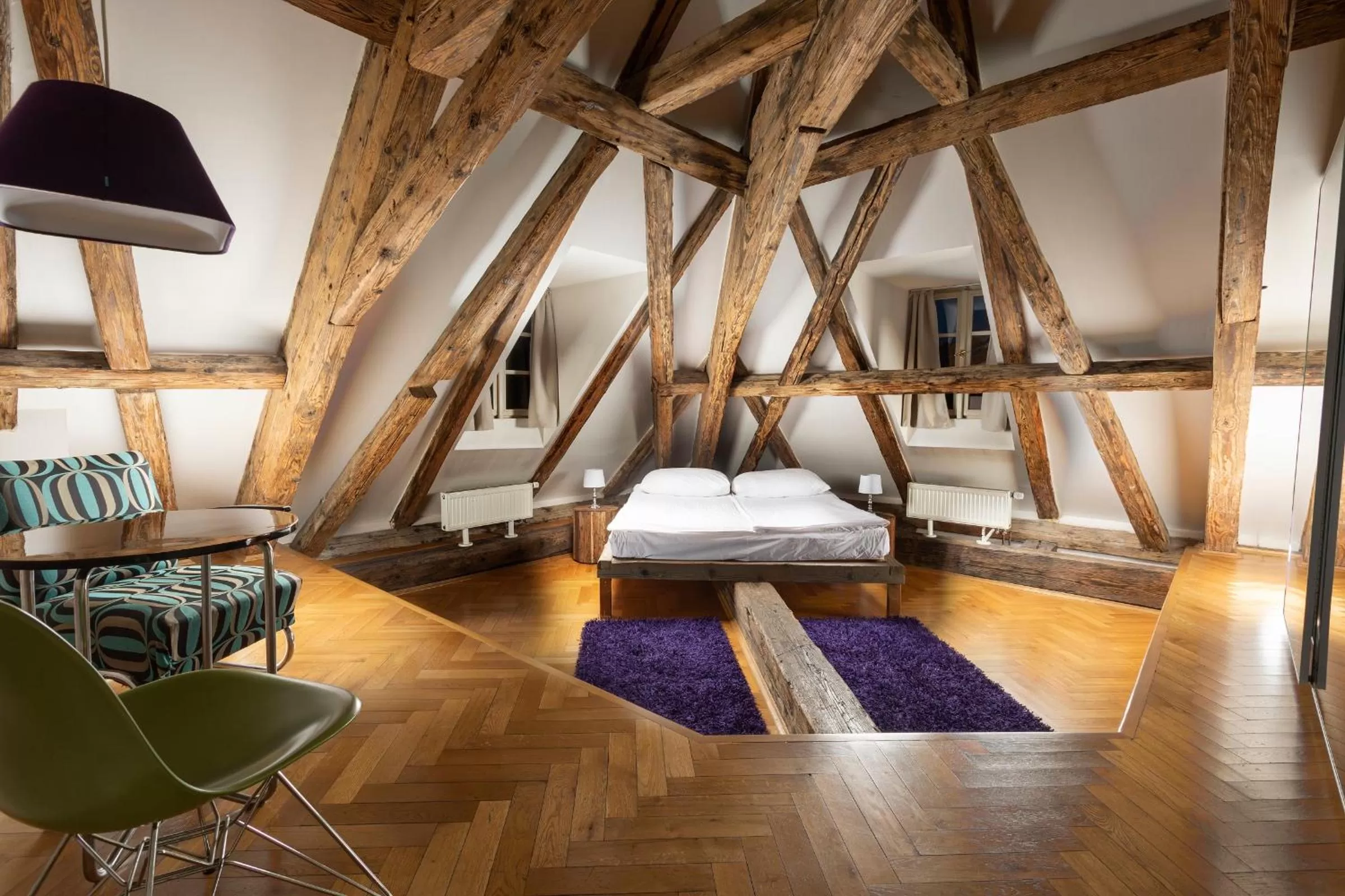 Bed in Three Golden Crowns Apartments