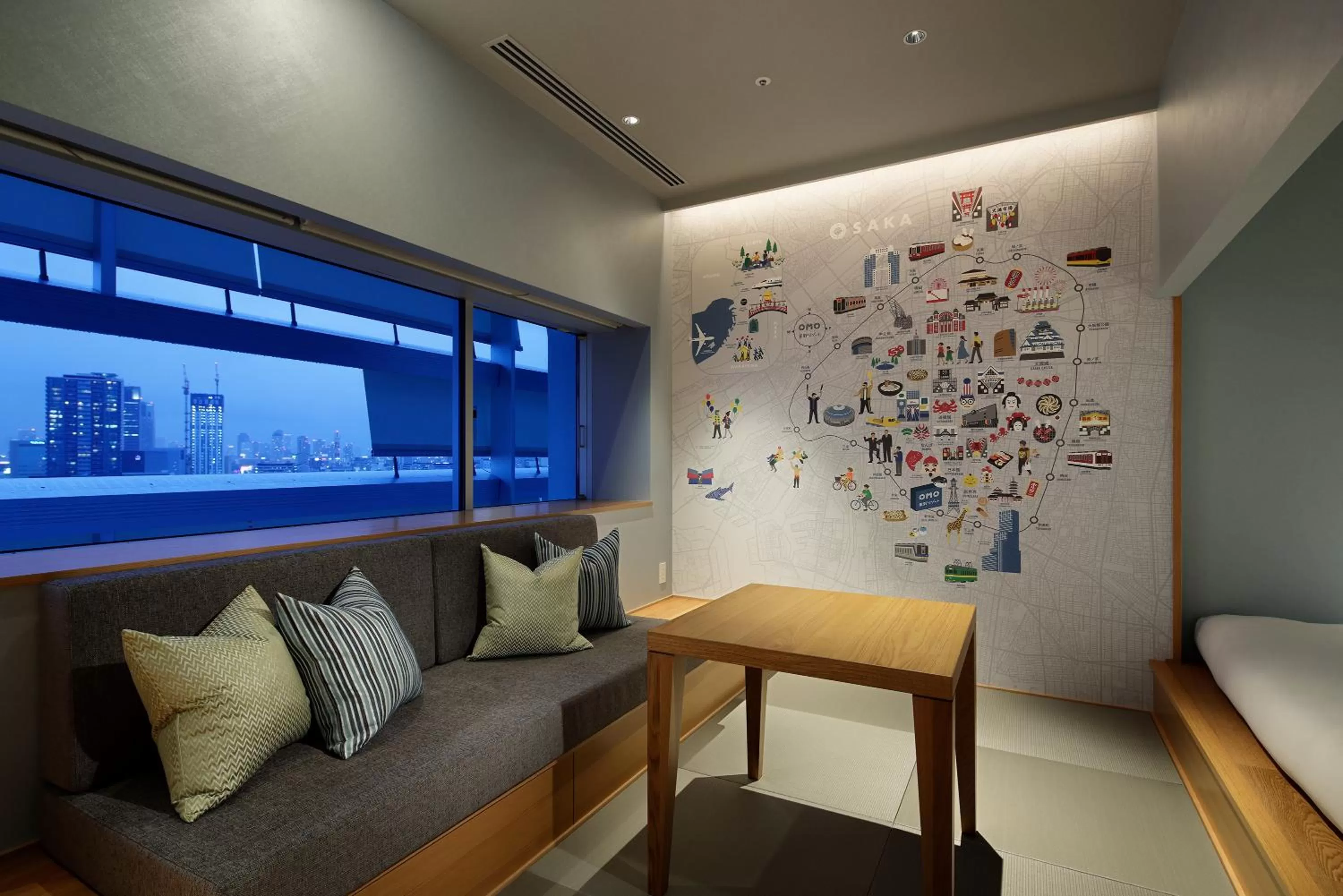 Living room in OMO7 Osaka by Hoshino Resorts