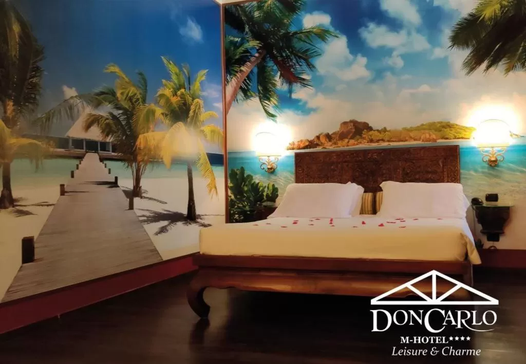 Bed in Hotel Don Carlo