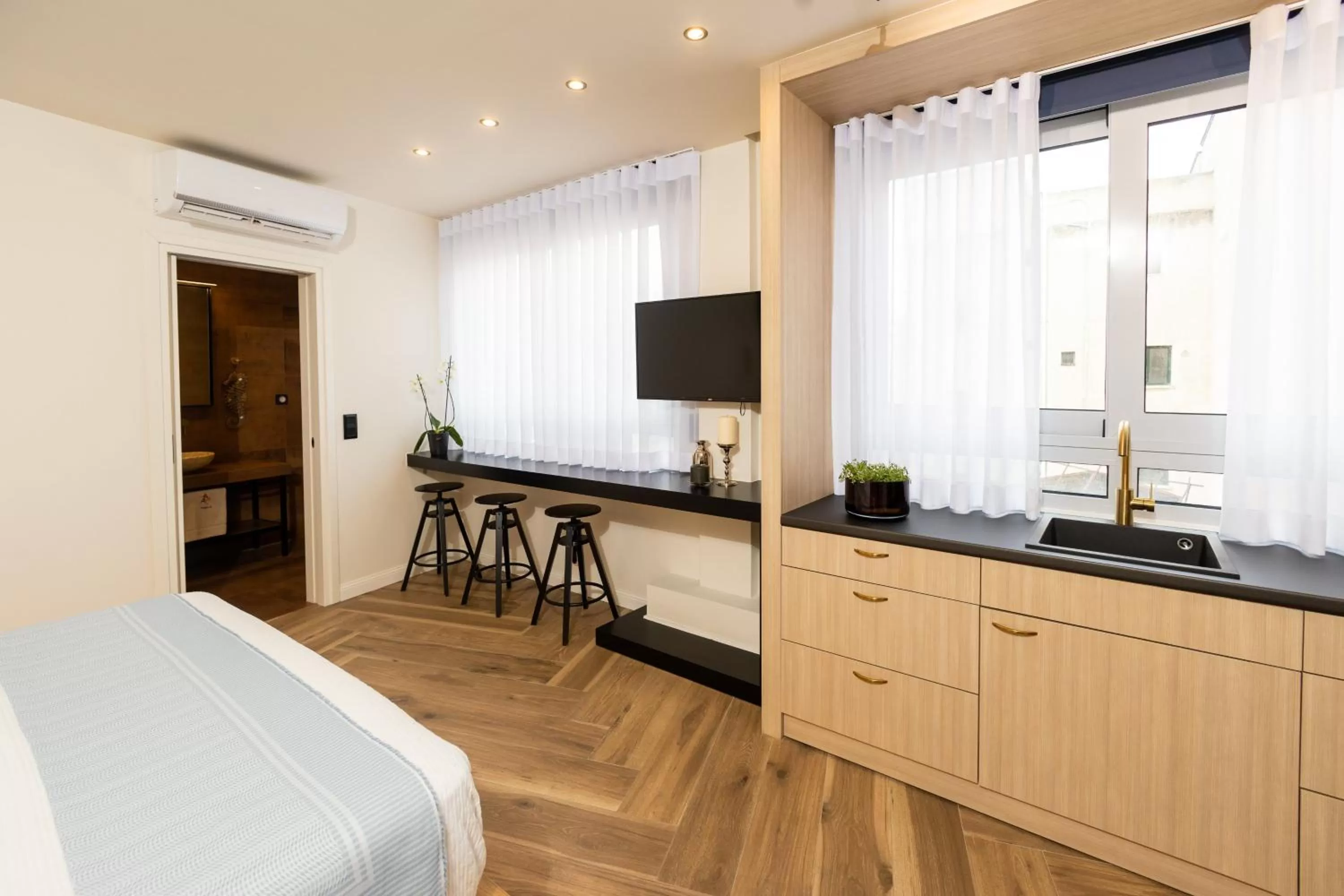 Bedroom, TV/Entertainment Center in Triple A - Apartments Accommodation in Prime Location (Between Monastiraki & Syntagma Square)