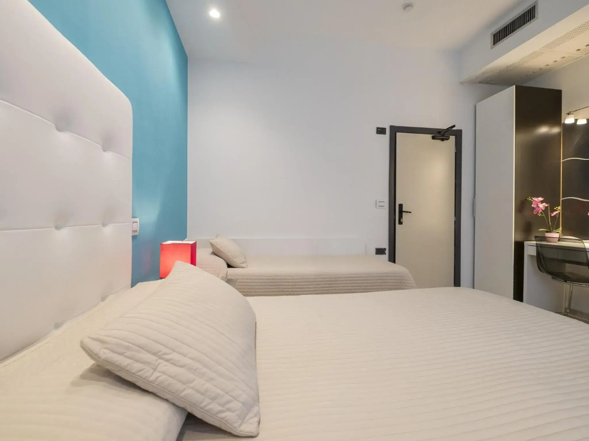 Triple Room in Hotel Levante Triple Room in Hotel Levante