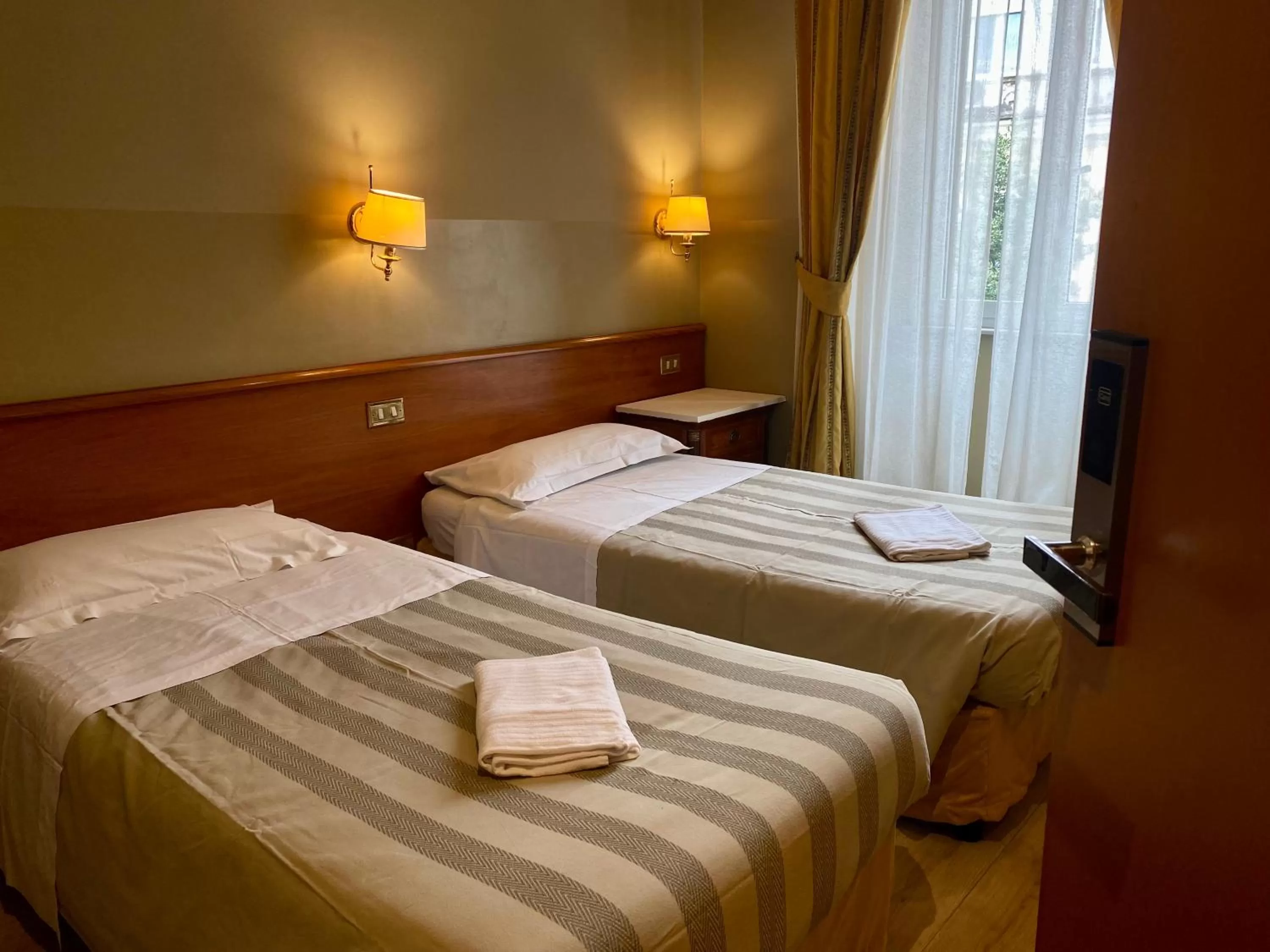 Photo of the whole room, Bed in Hotel Giolitti