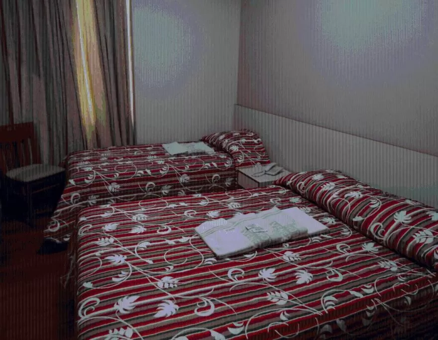 Photo of the whole room, Bed in Hotel Venezuela