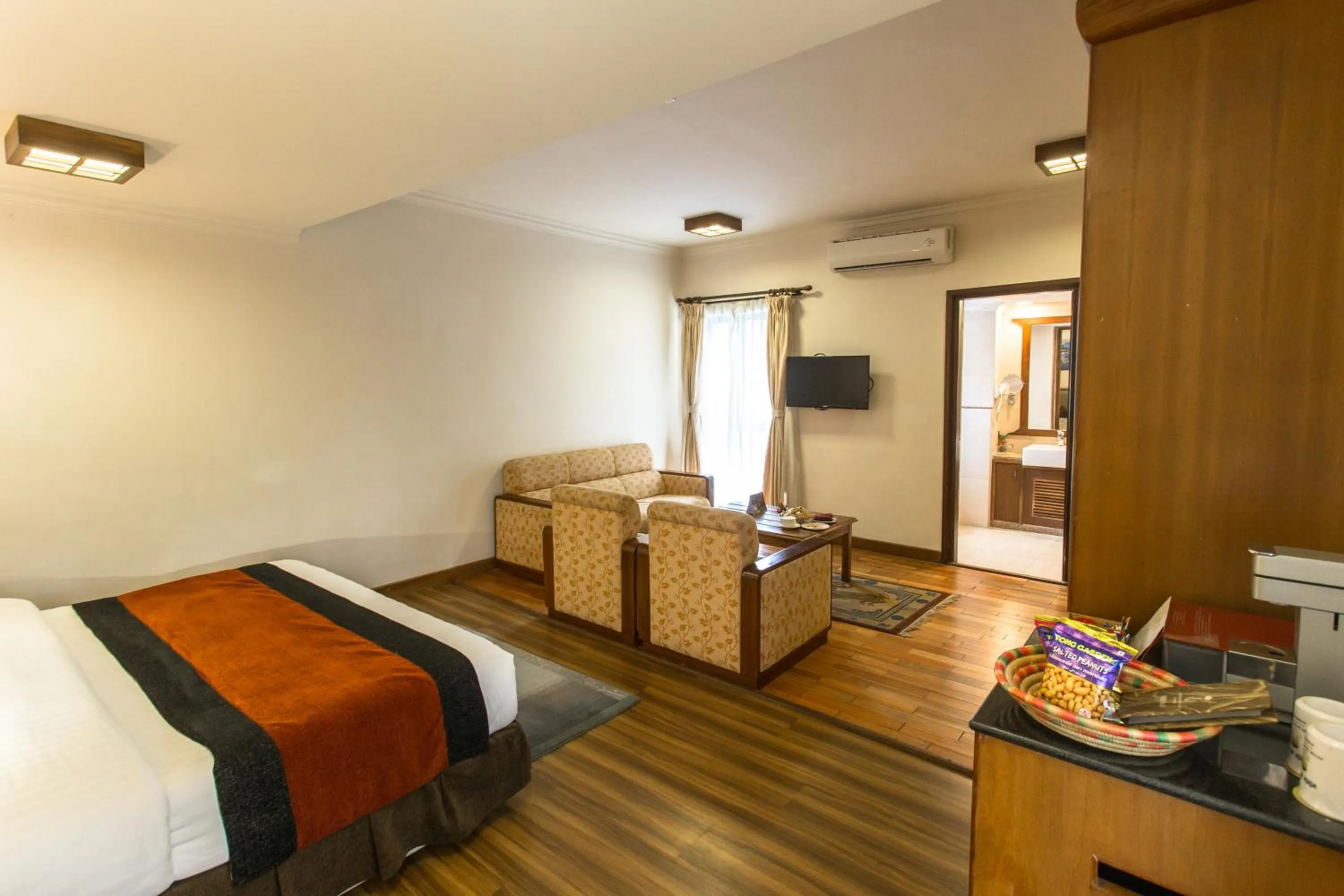 Photo of the whole room, Bed in Atithi Resort & Spa