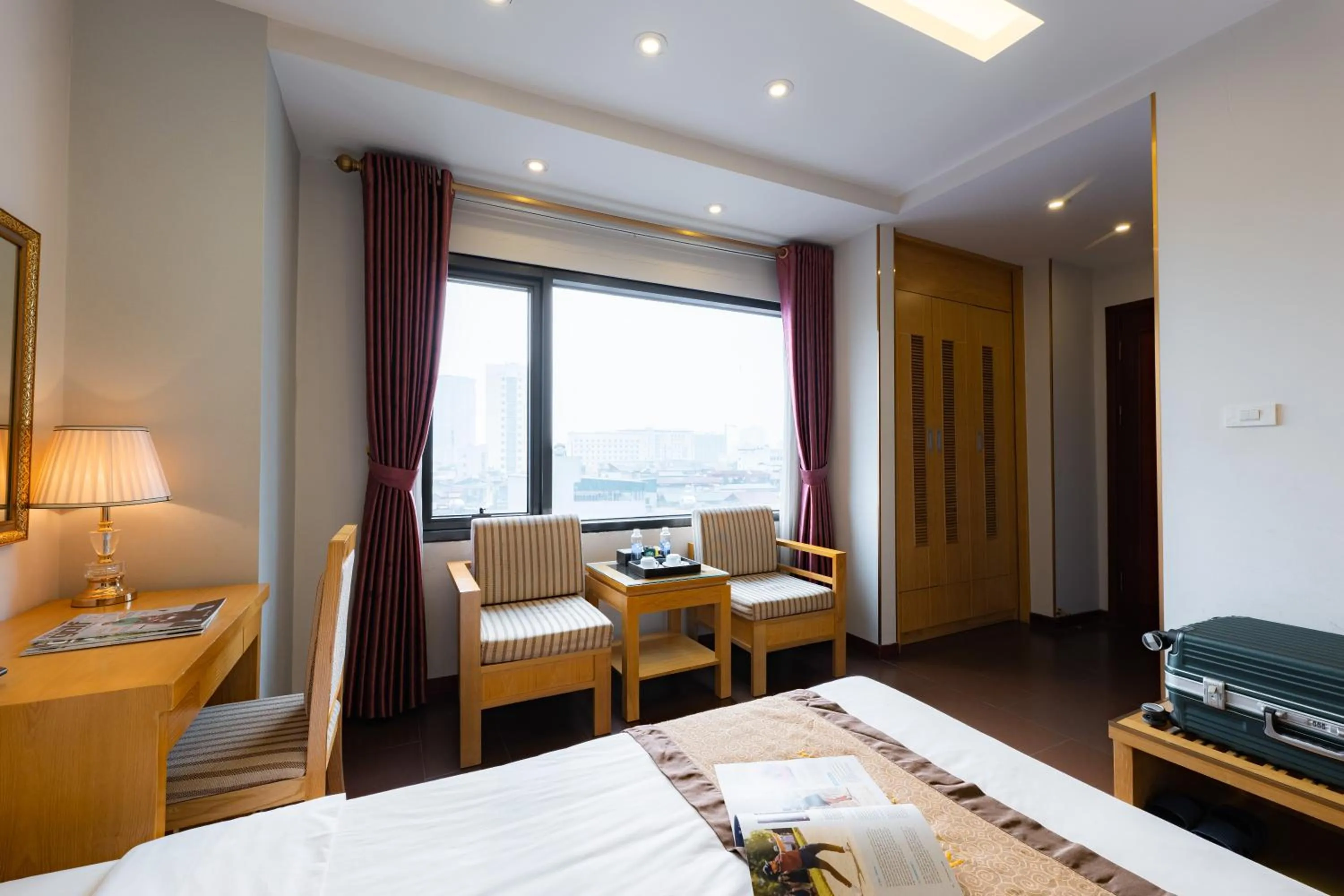 Bed in Riverside Hanoi Hotel