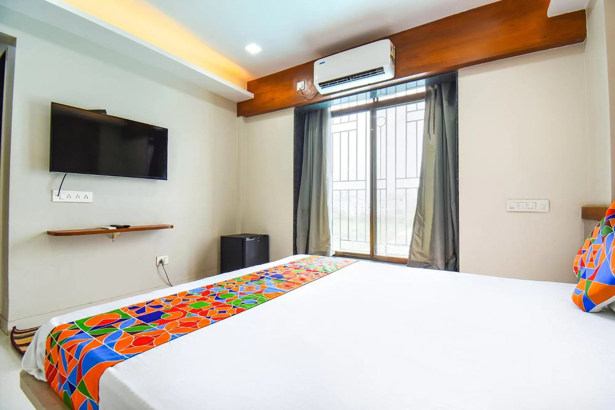 Bed in FabHotel Prime Rajmudra - Nr Butterfly Park - Hinjawadi