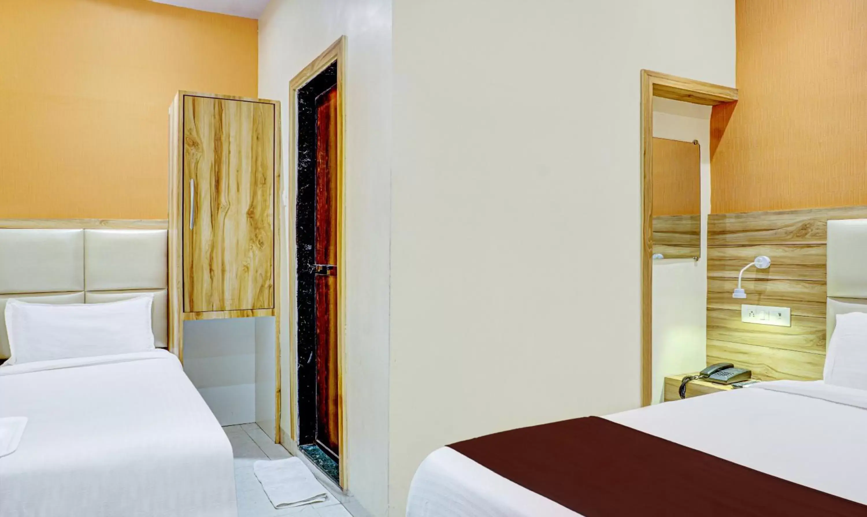 Deluxe Triple Room - 10% discount on food and soft beverage in Hotel Sun City - Near Saifee Hospital And H N Reliance Hospital Deluxe Triple Room - 10% discount on food and soft beverage in Hotel Sun City - Near Saifee Hospital And H N Reliance Hospital