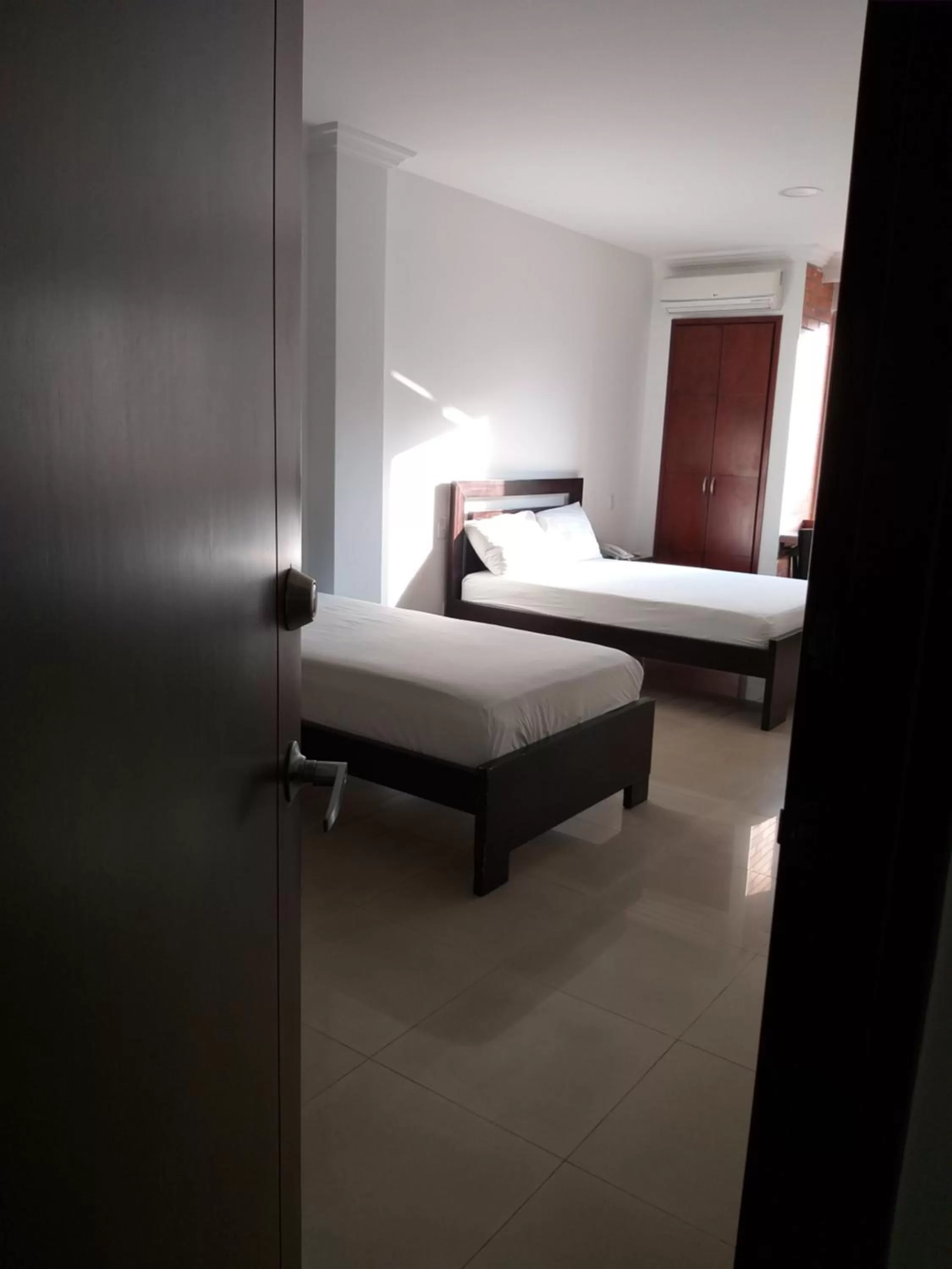 Photo of the whole room, Bed in Pampalinda Hotel