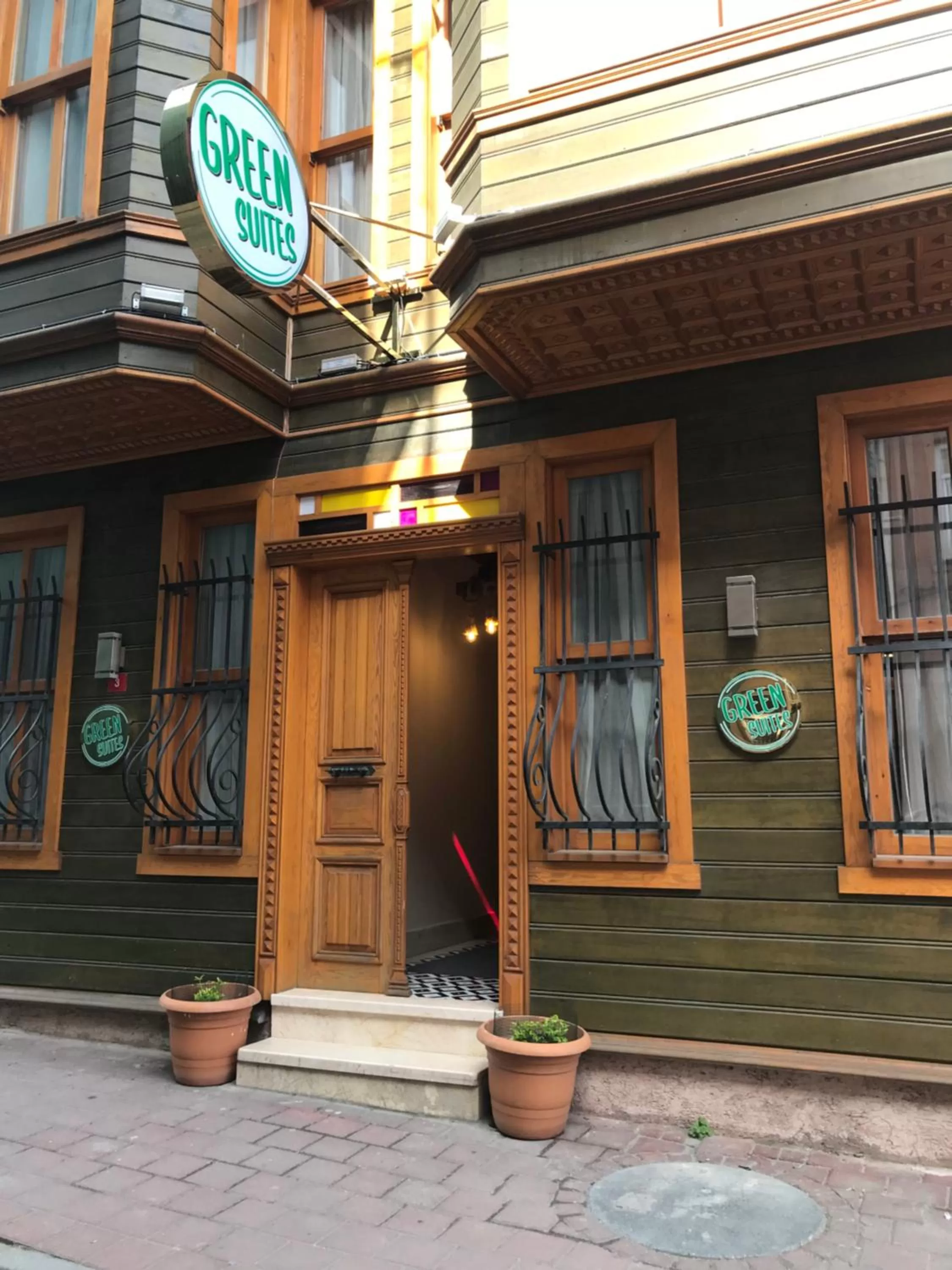 Property logo or sign in Green Mansion