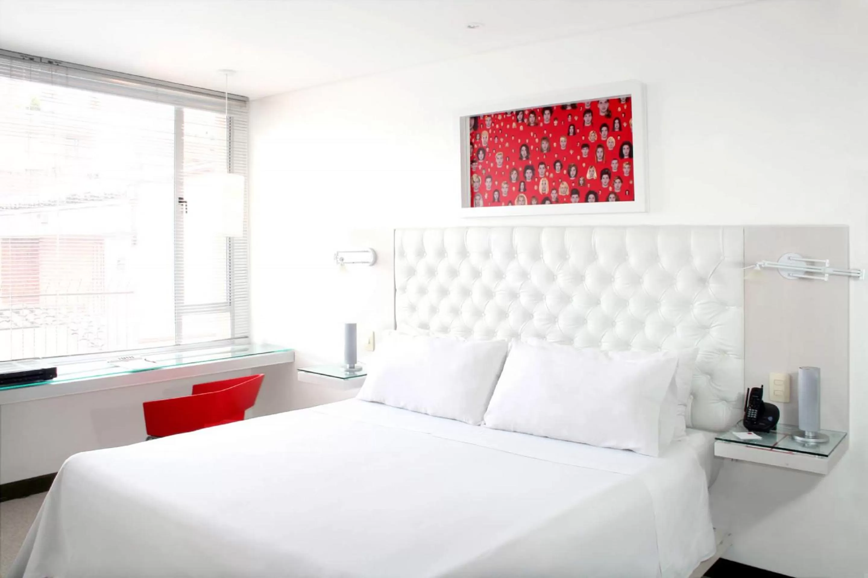 Bed in Hotel 104 Art Suites