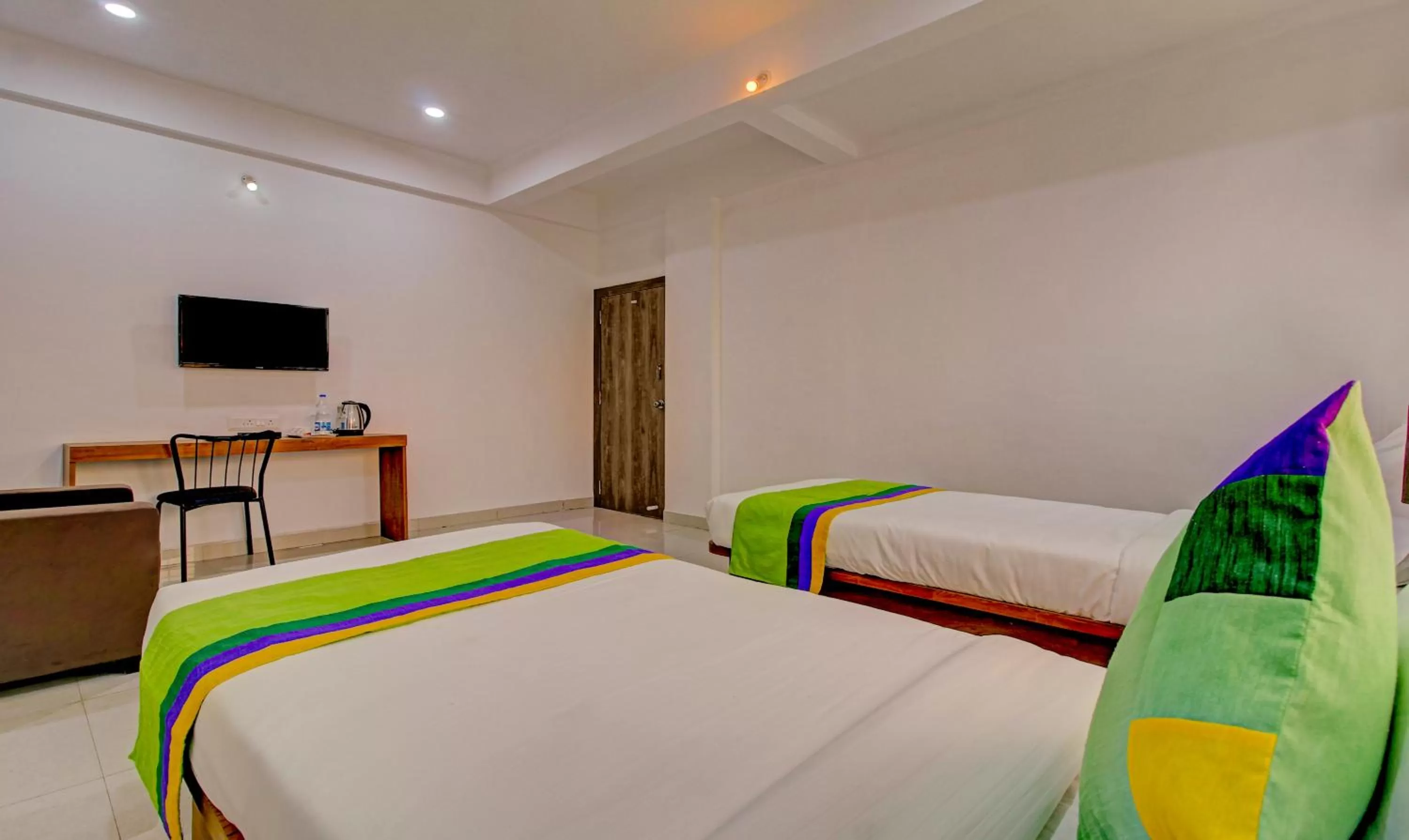 Bed in Treebo Trend White House