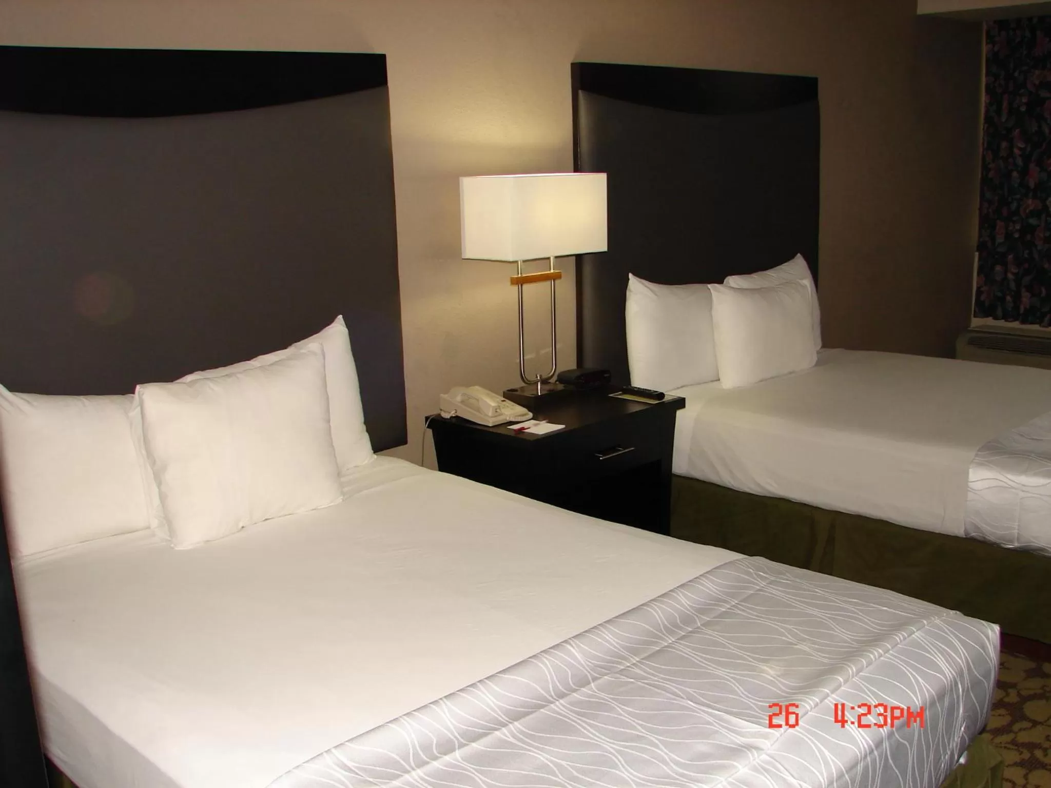 Bed in Ramada Plaza by Wyndham Charlotte South End Airport