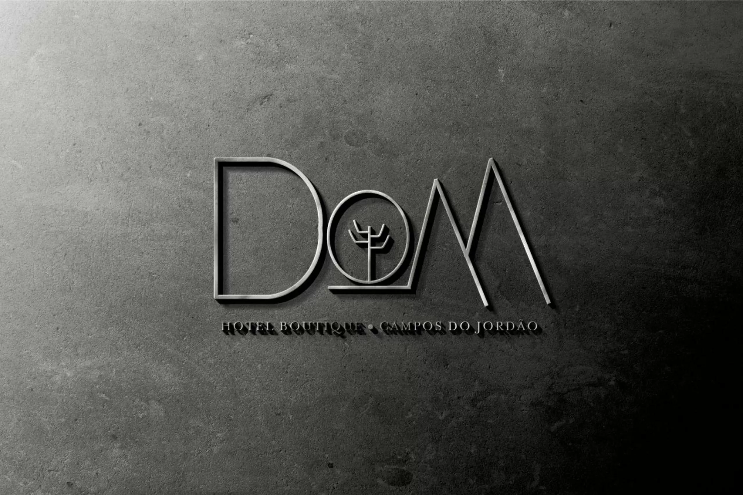 Property logo or sign in DOM Hotel Boutique