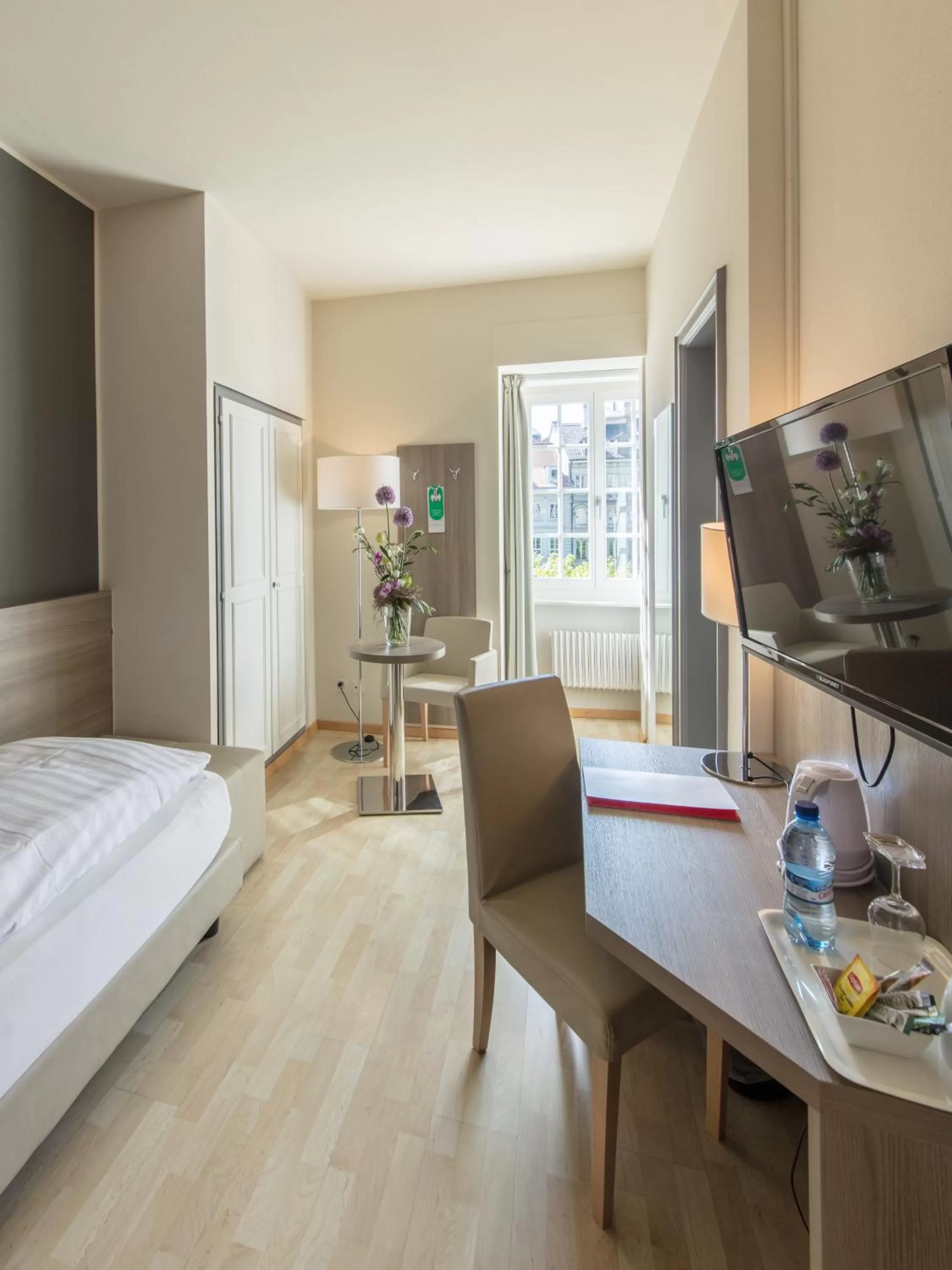 Photo of the whole room, Bed in Hôtel de la Rose