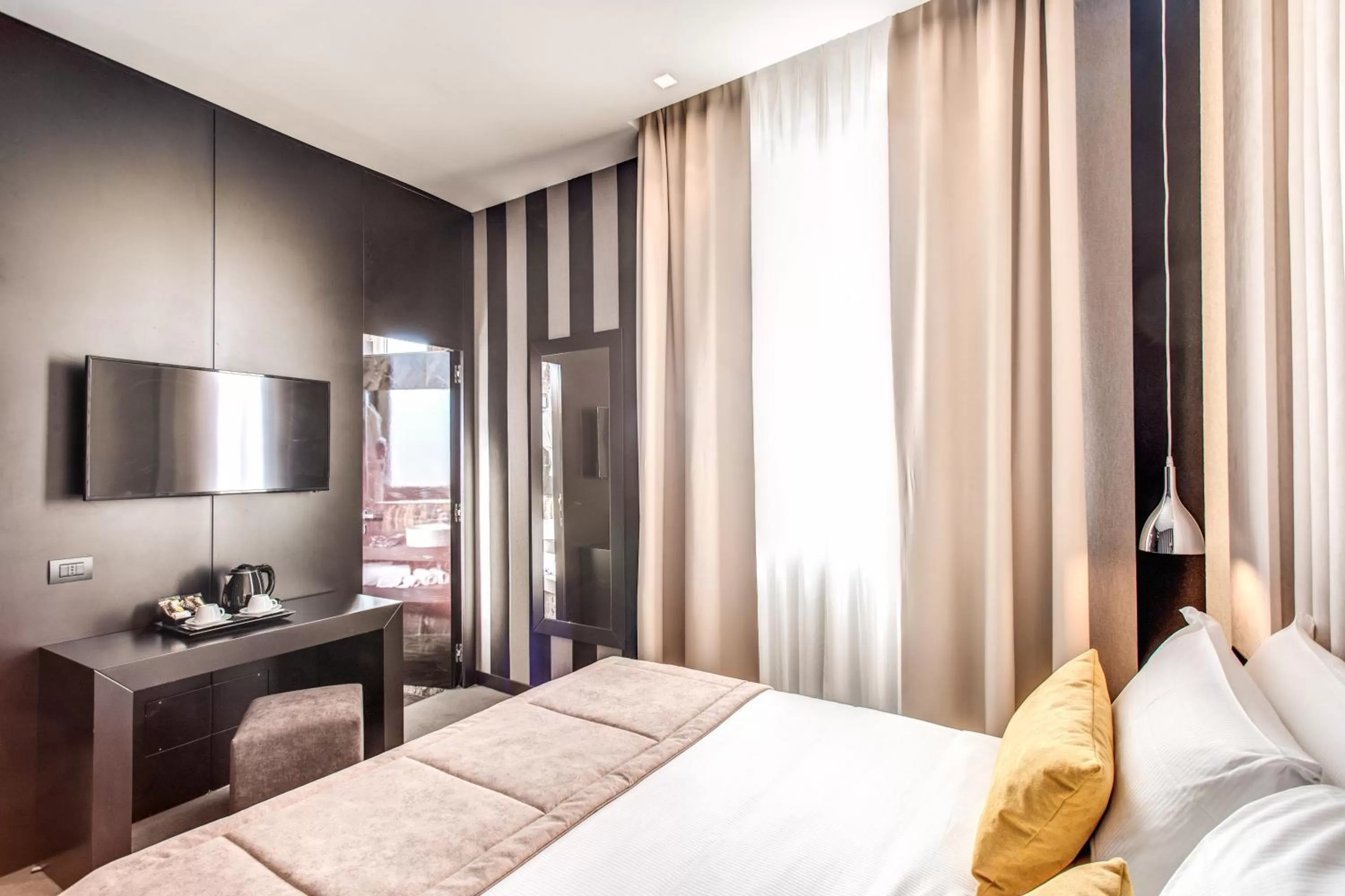 Bed in Doria Palace Boutique Hotel