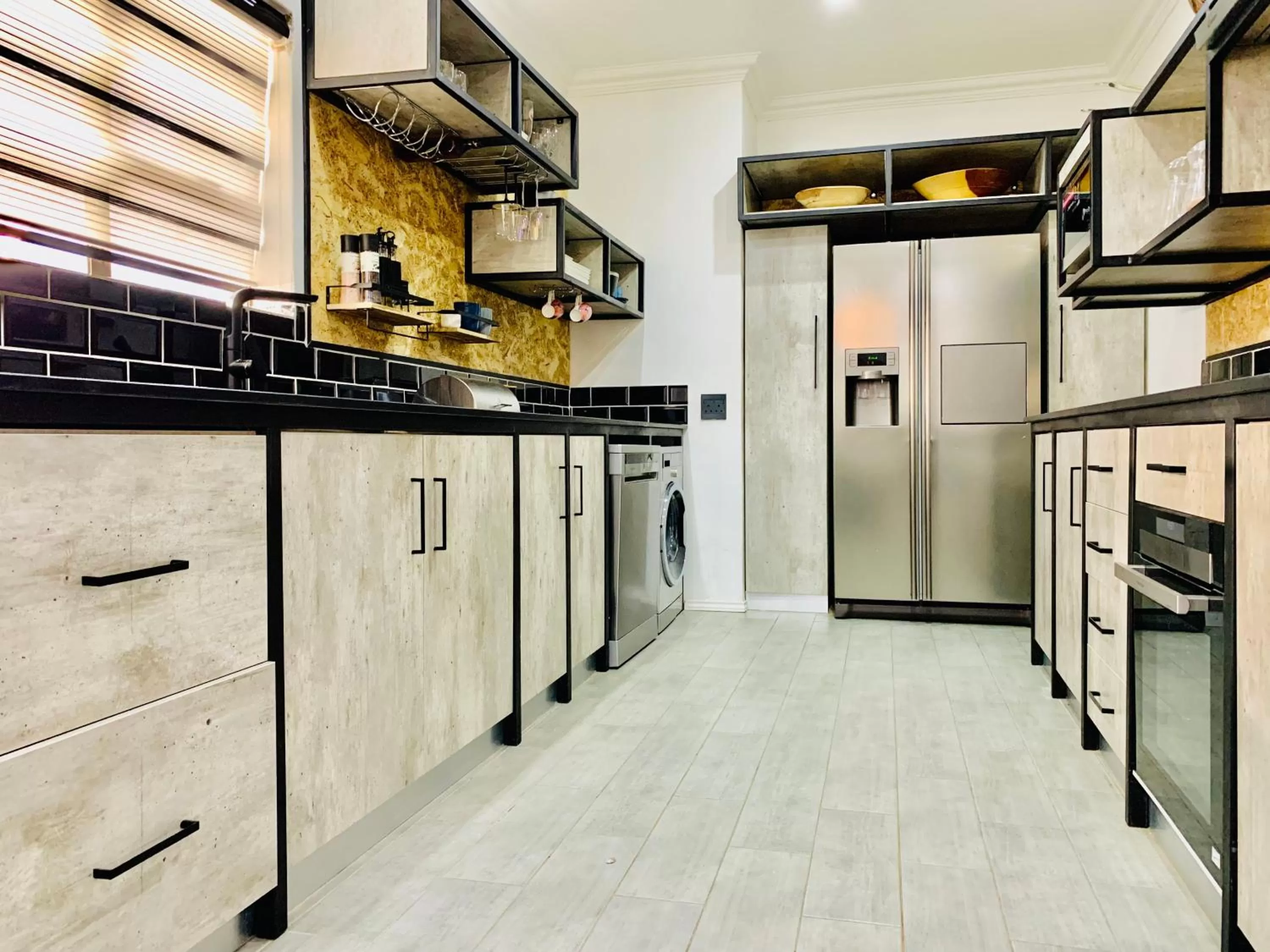 Kitchen/Kitchenette in 24 On Basil Inventive suites