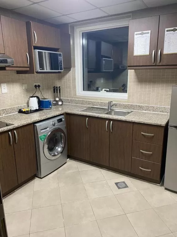 Kitchen/Kitchenette in VISTA HOTEL APARTMENTS DELUXE