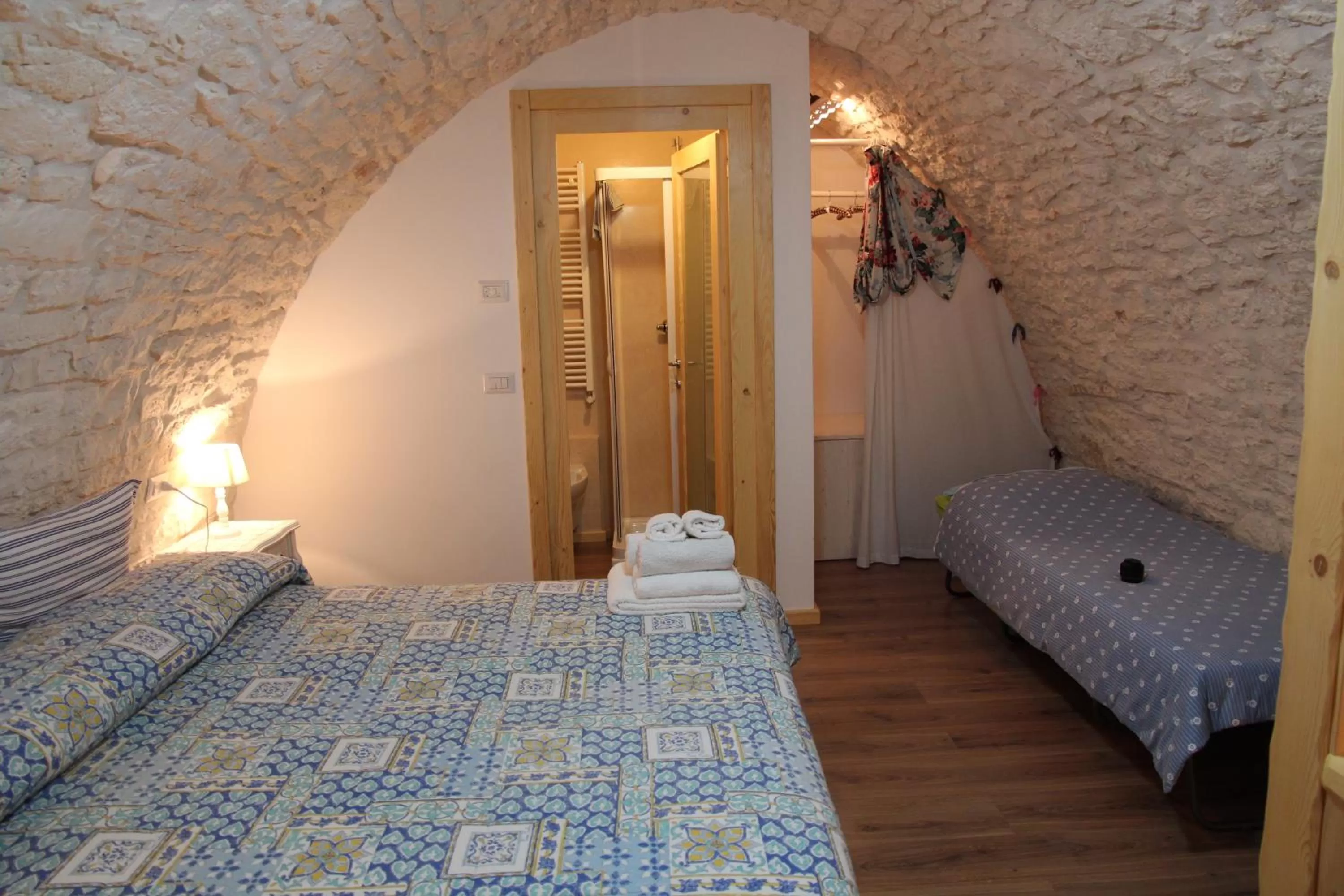 Photo of the whole room, Bed in Trulli Donna Isabella