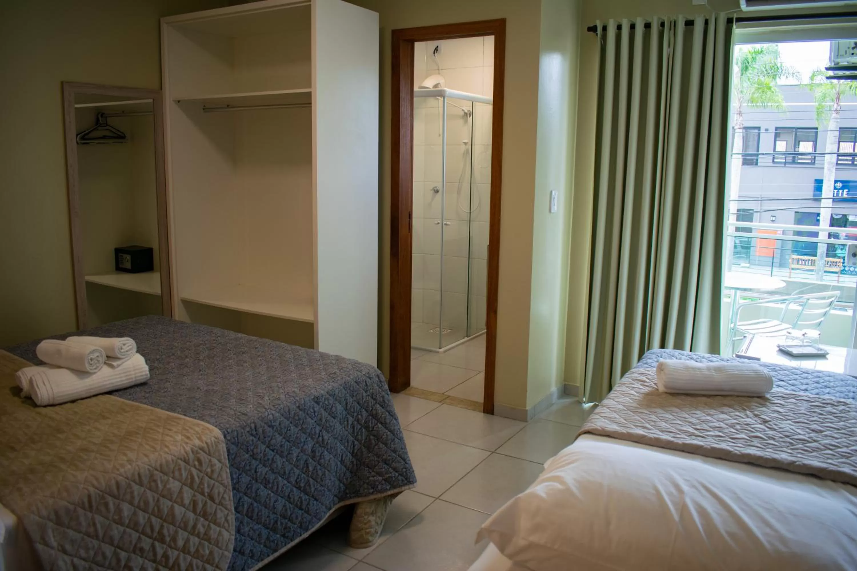 Bed in Pousada Tissiano