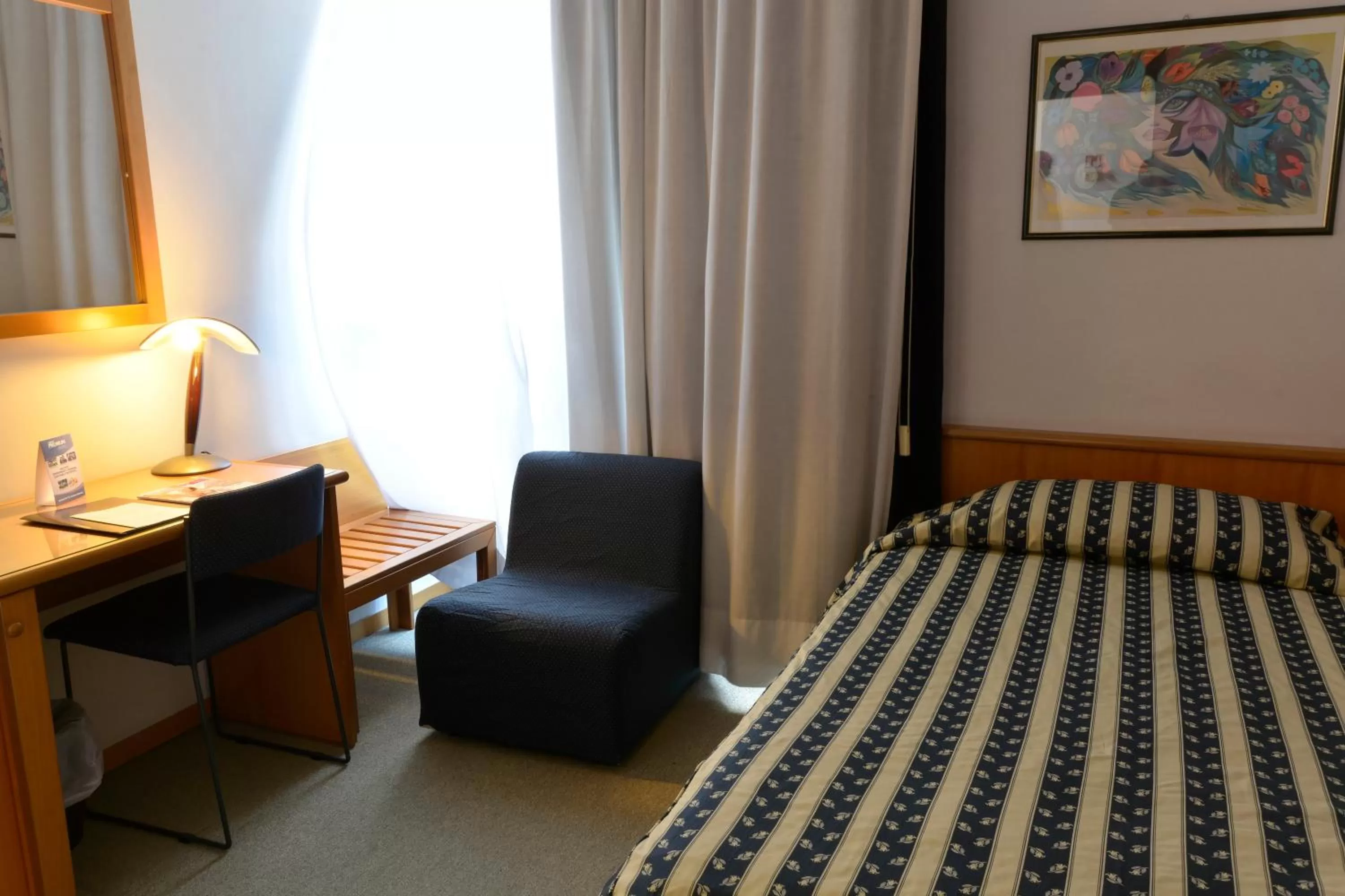 Bed in Grand Hotel Tiziano E Dei Congressi