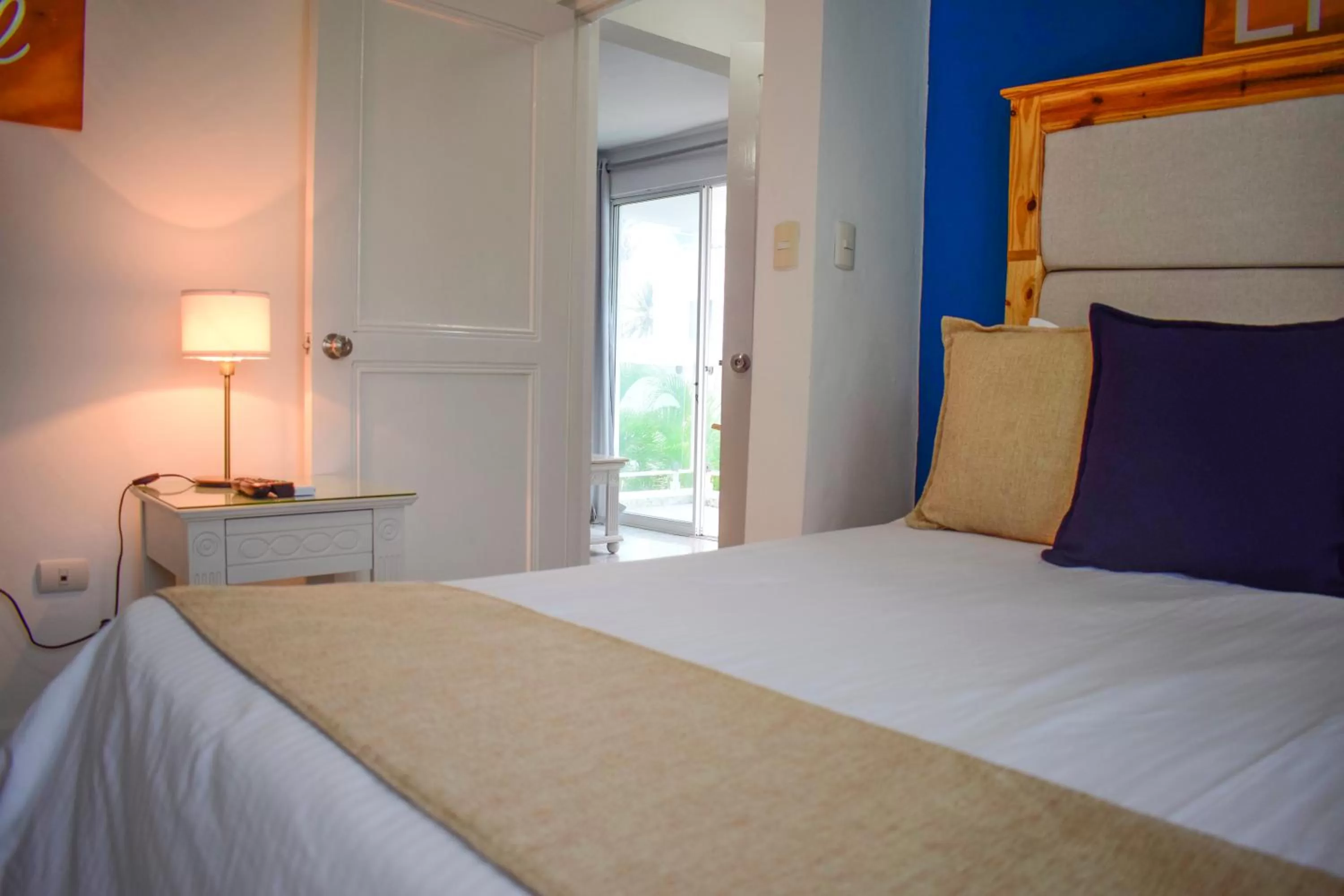 Bedroom, Bed in Hotel Checkin El Cortecito Beach