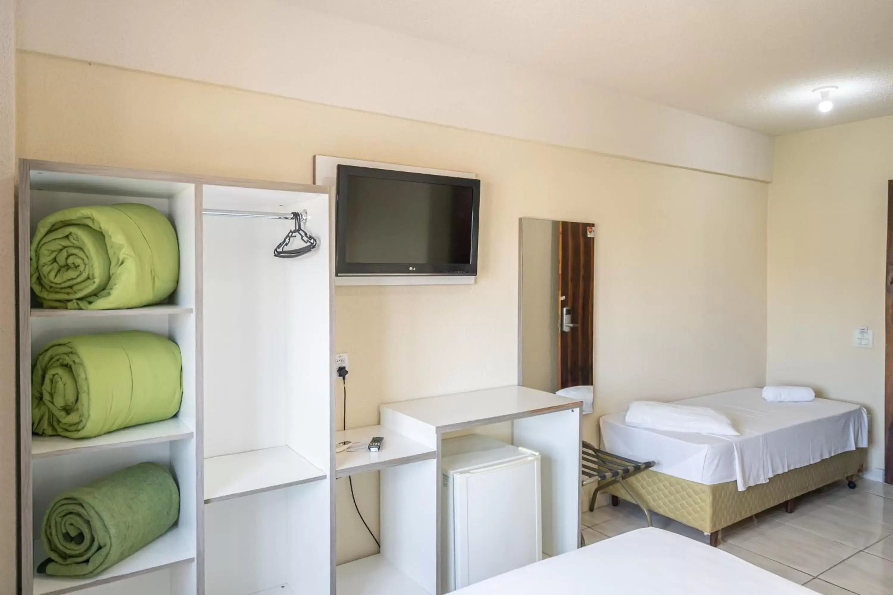 Deluxe Quadruple Room - single occupancy in Hotel Conexão Deluxe Quadruple Room - single occupancy in Hotel Conexão