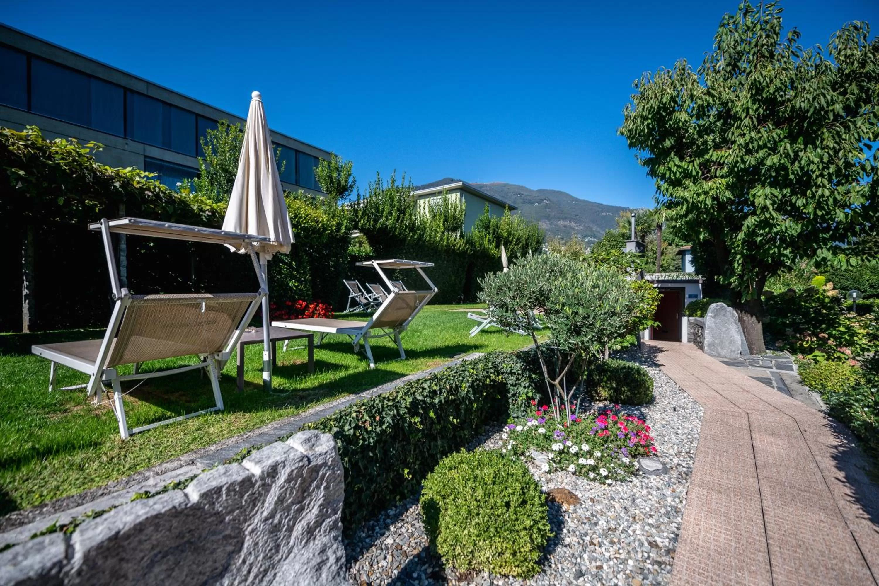 Garden in Ascona Lodge, Pool & Garden Retreat