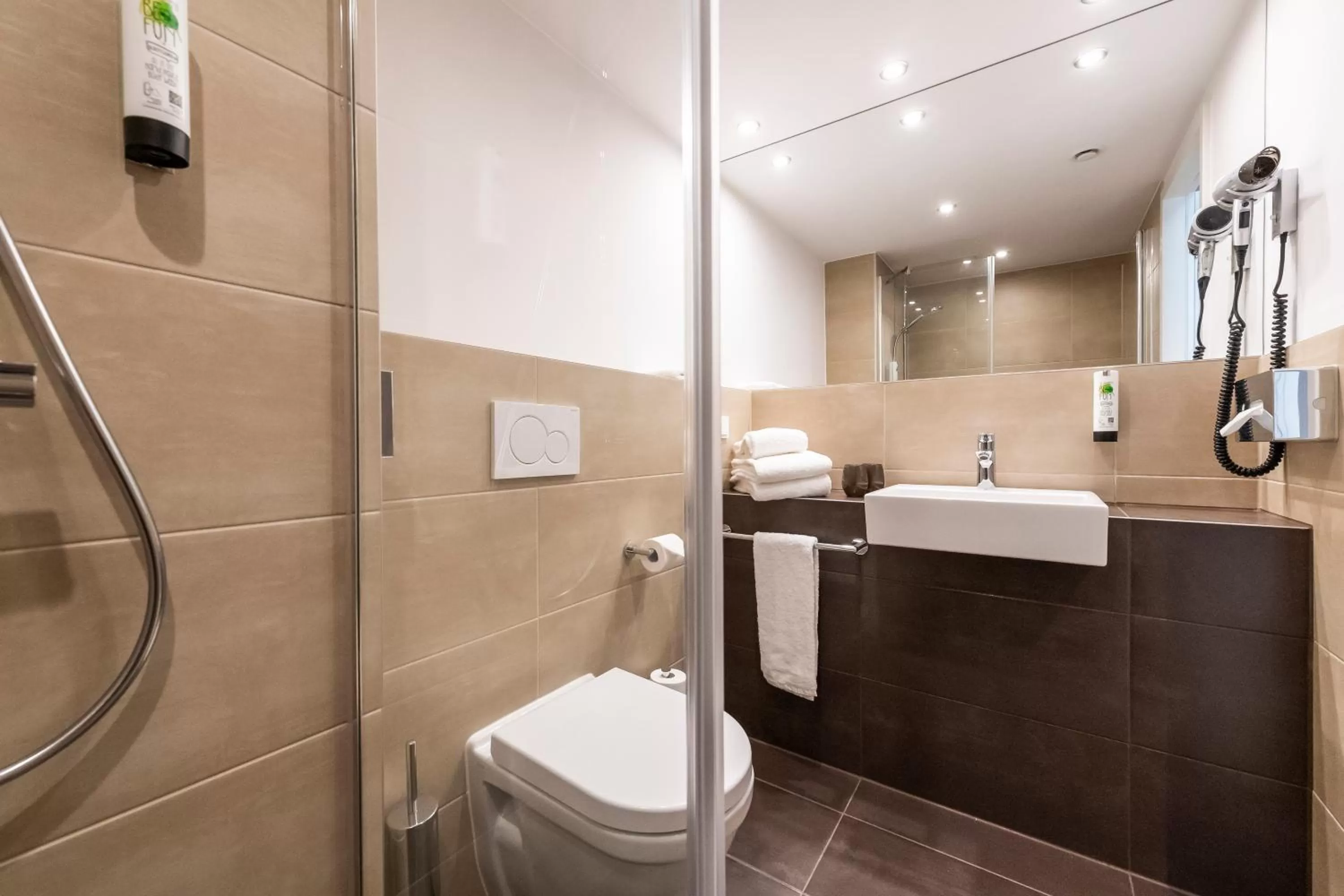 Shower in HARBR Hotel Heilbronn, a member of Radisson Individuals