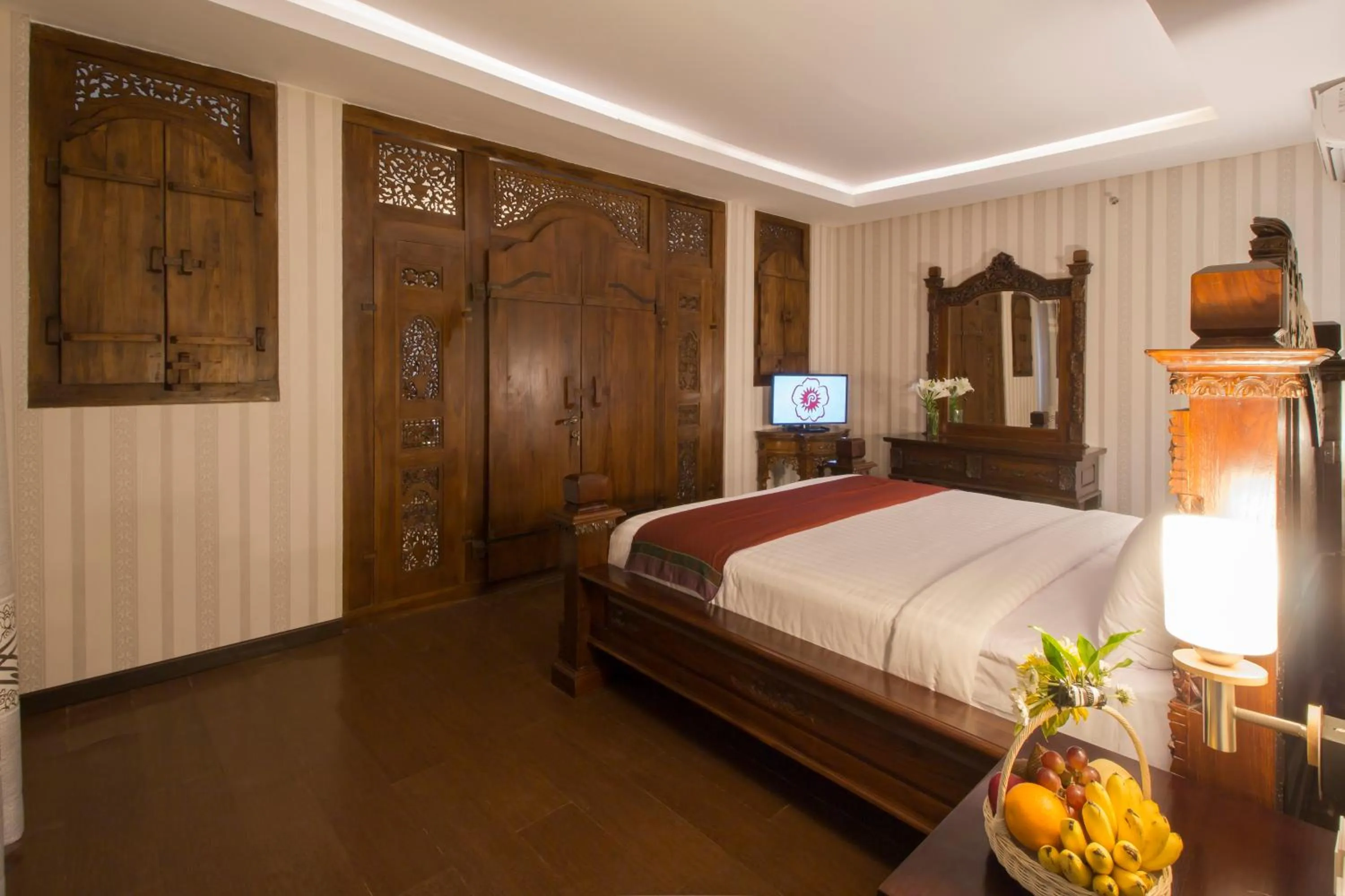 Bed in Grand Puri Saron Hotel Yogyakarta