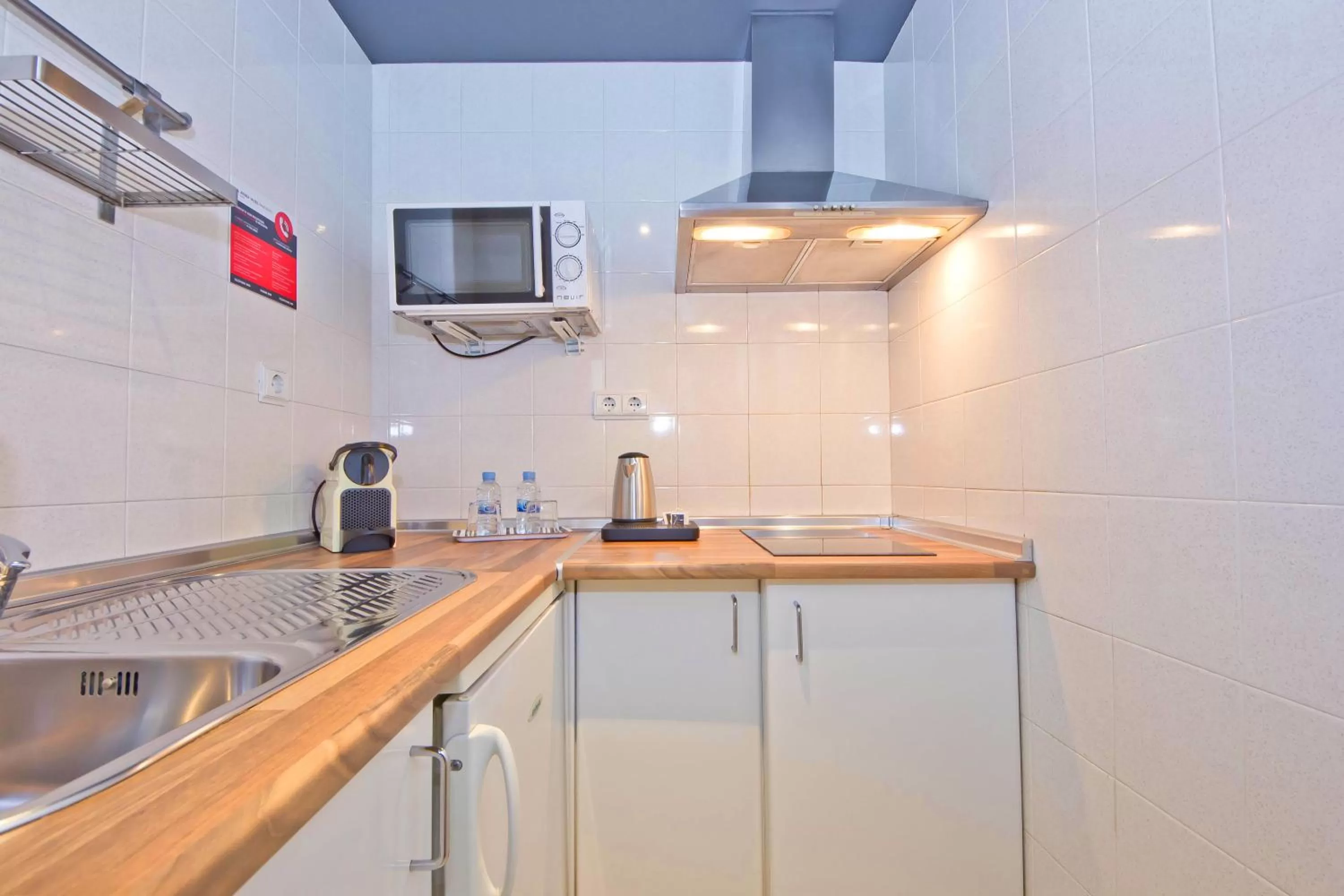 Kitchen or kitchenette in Aparthotel Atenea Valles