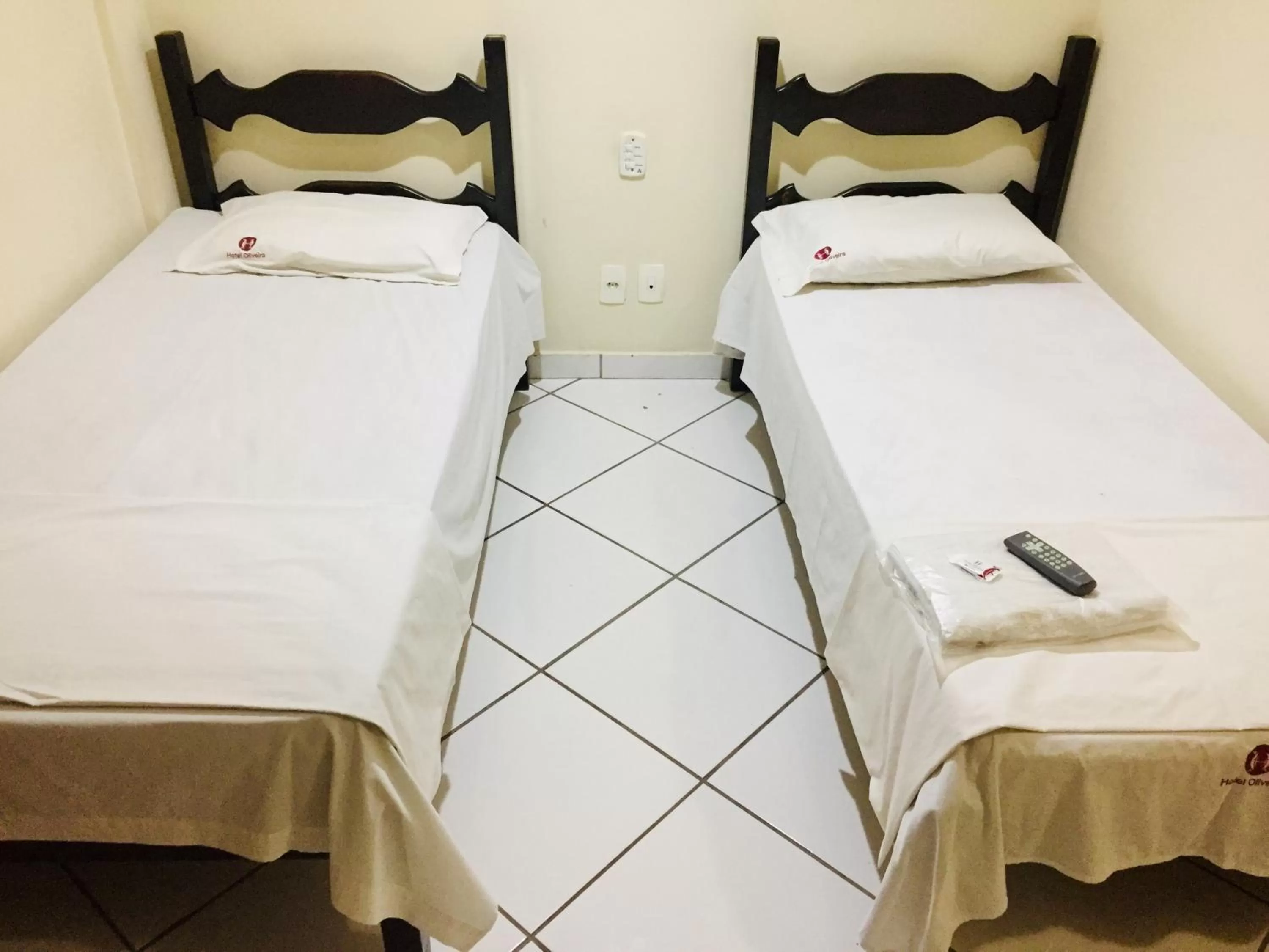 Bed in Hotel Oliveira