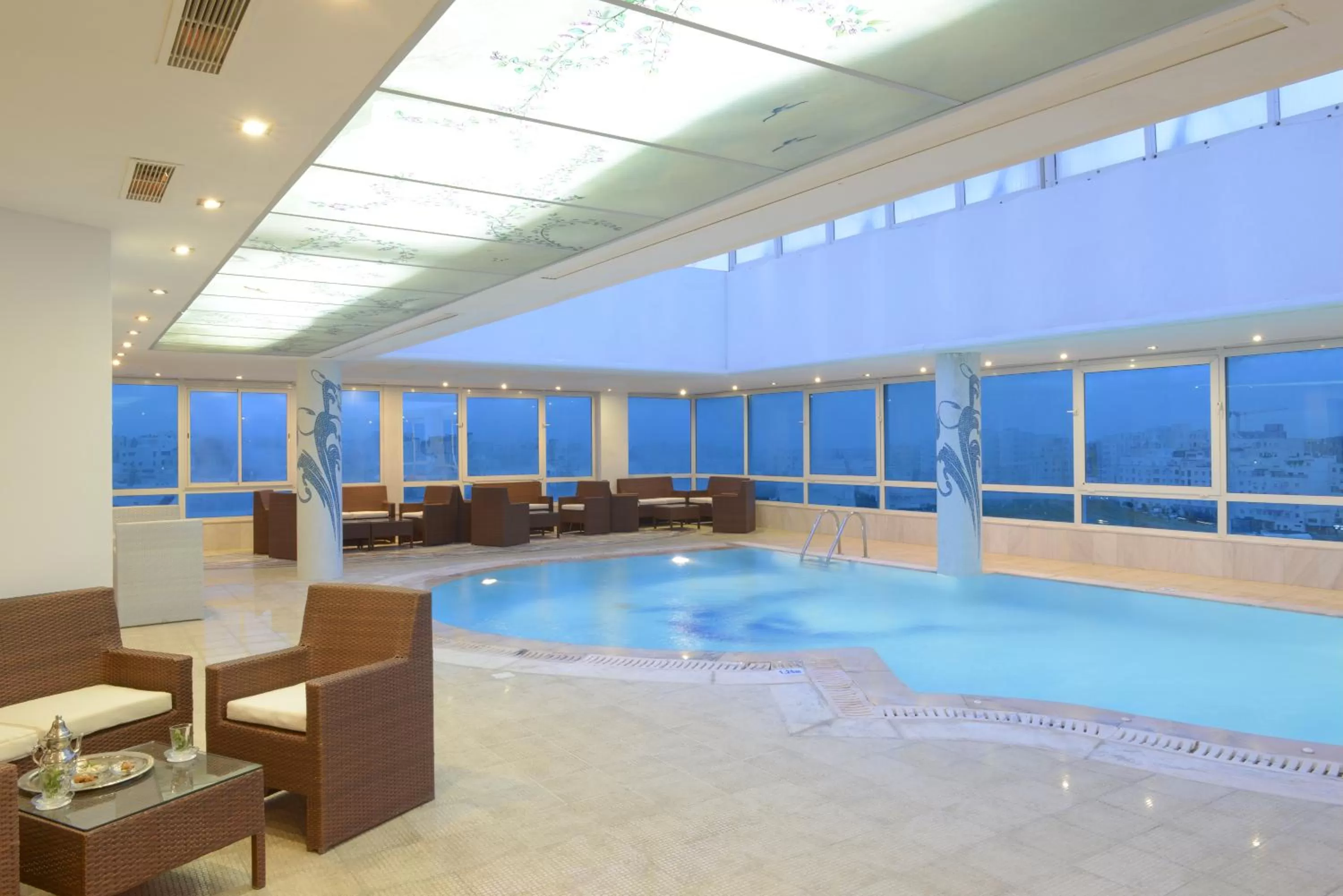 Swimming pool in The Penthouse Suites Hotel