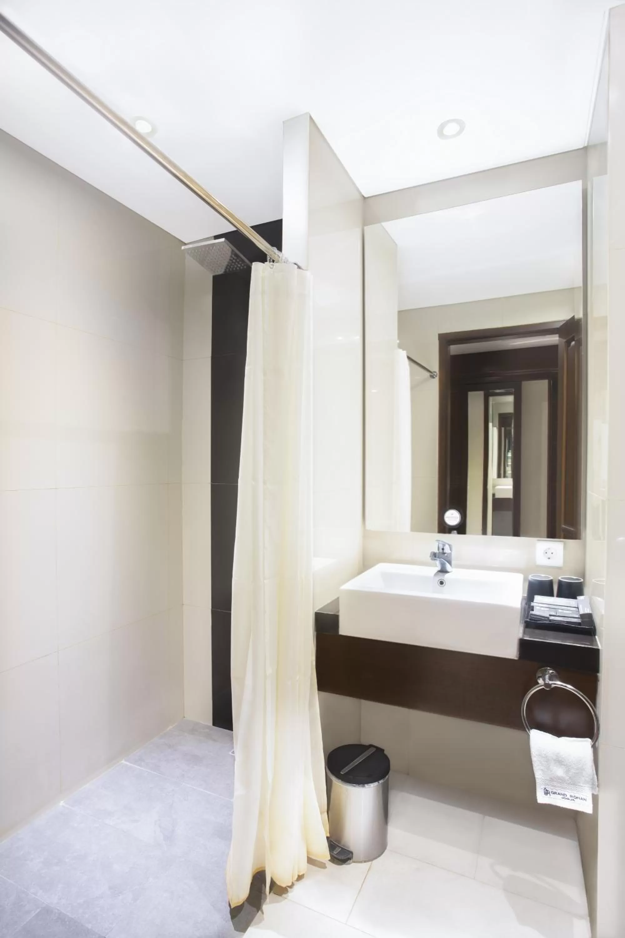 Bathroom, Bed in Grand Rohan Jogja
