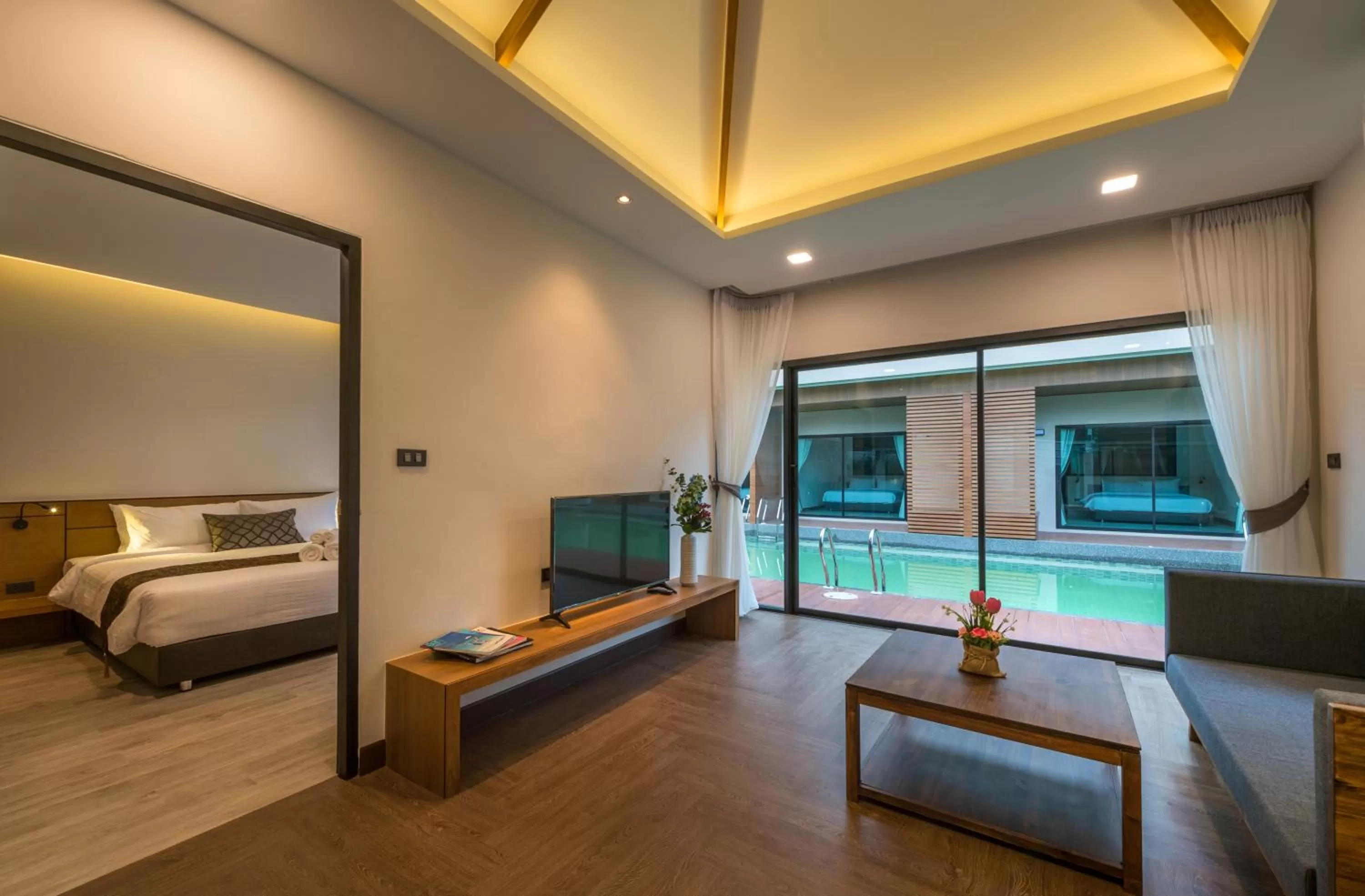 Bed in Cher​mantra​ Aonang​ Resort & Pool​ Suite