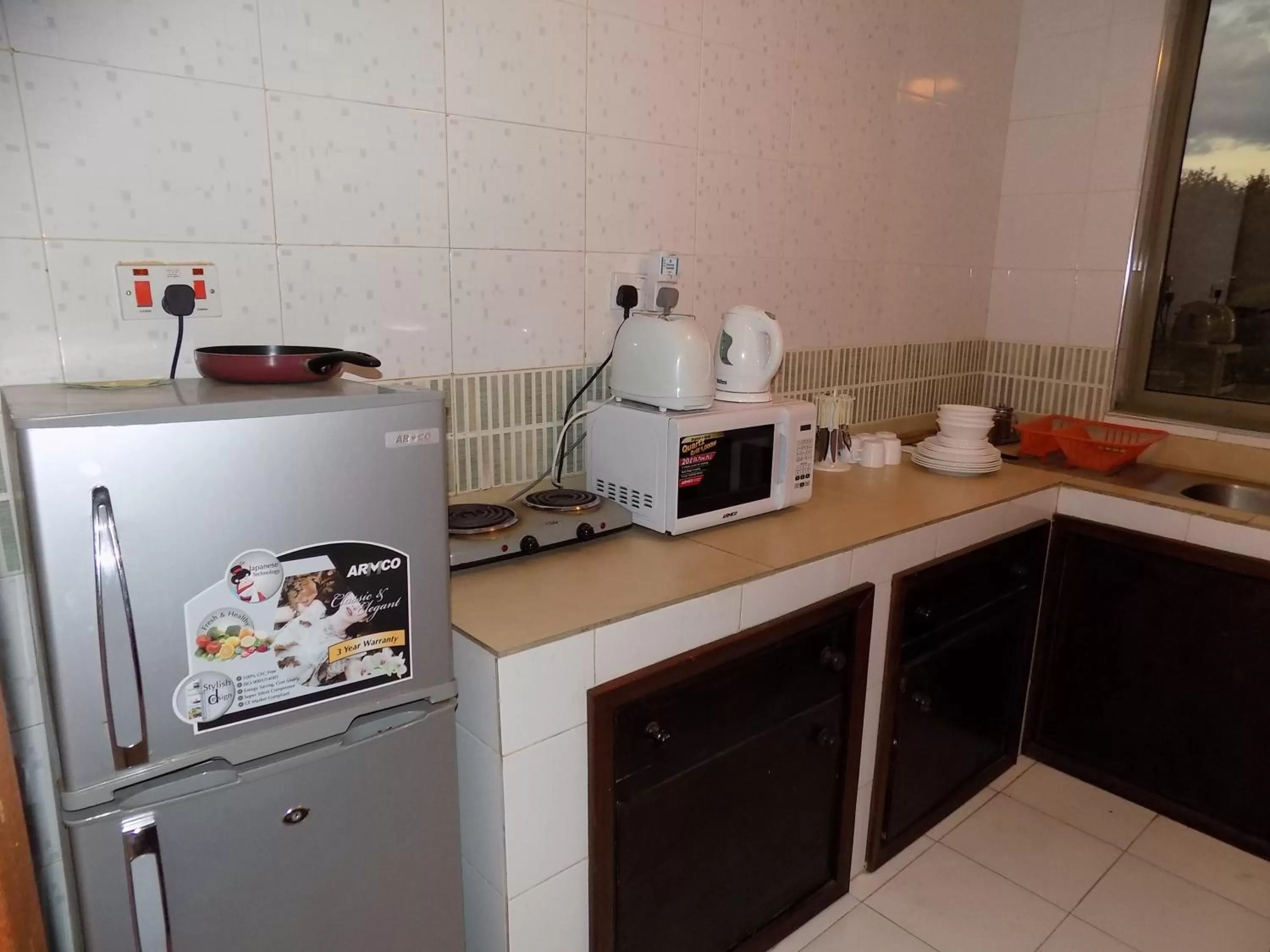 Kitchen or kitchenette in Kenya Comfort Suites
