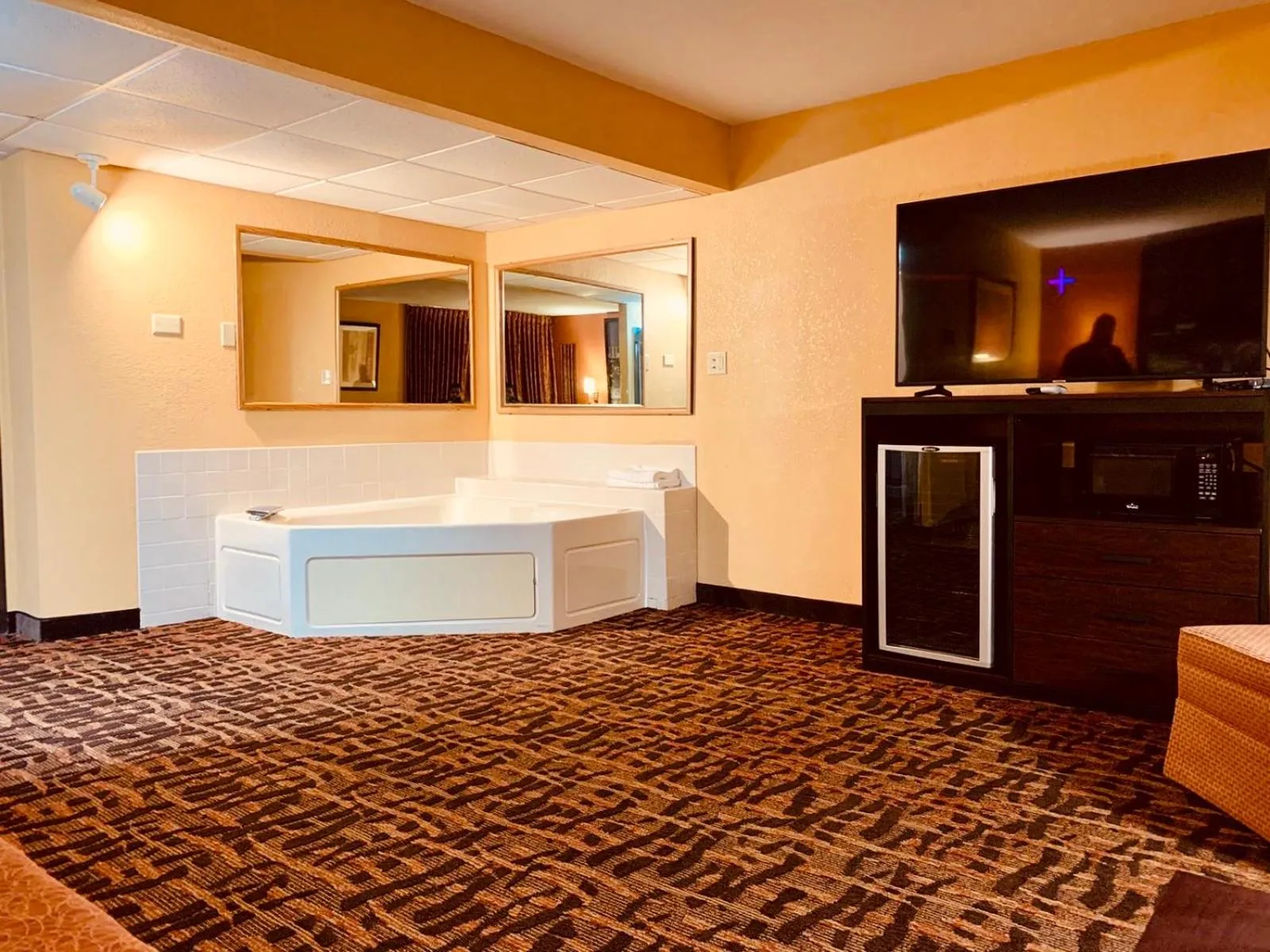 TV/Entertainment Center in Super 8 by Wyndham Lawrence KU