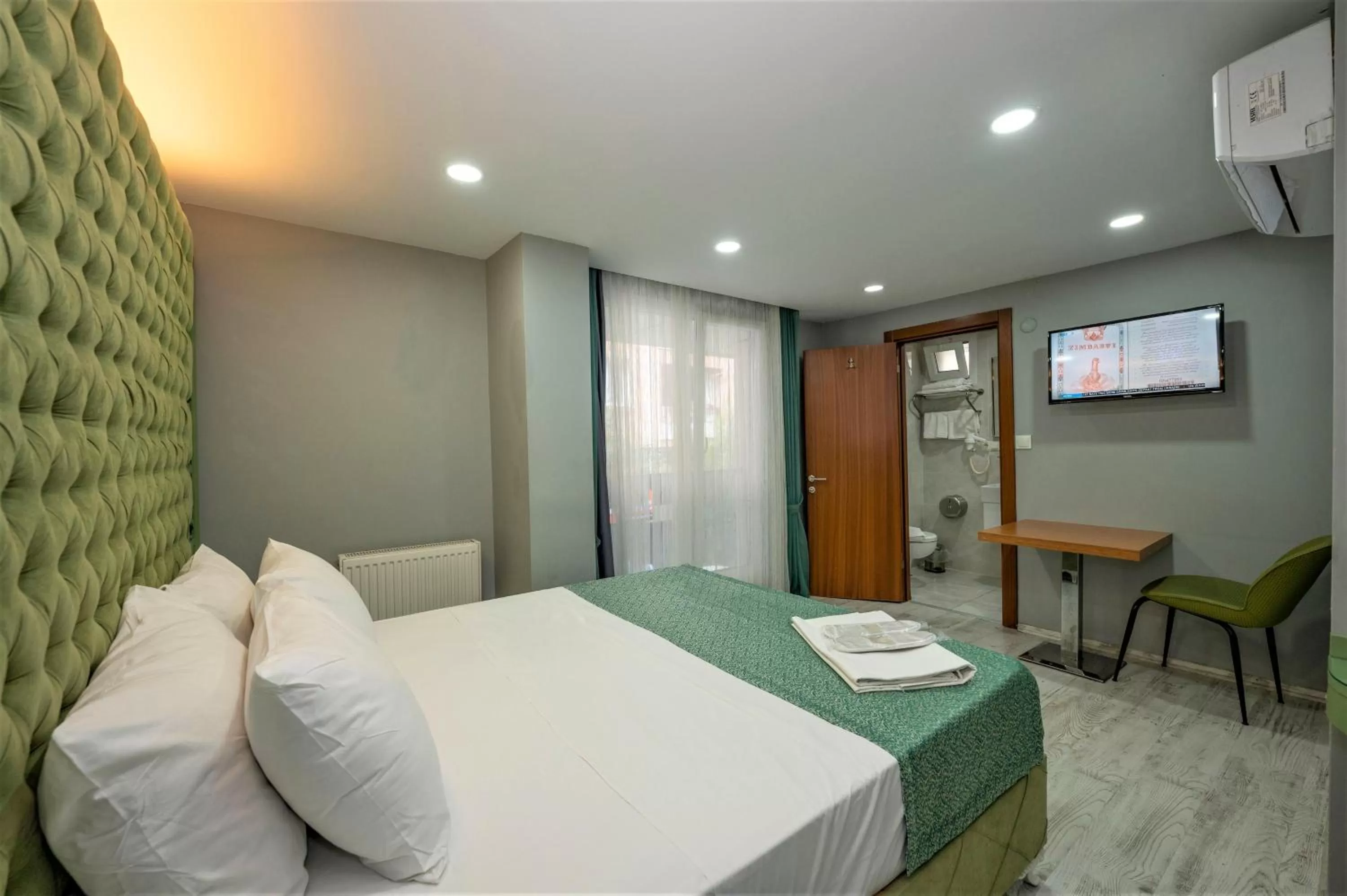 Photo of the whole room, Bed in Green Garden Hotel