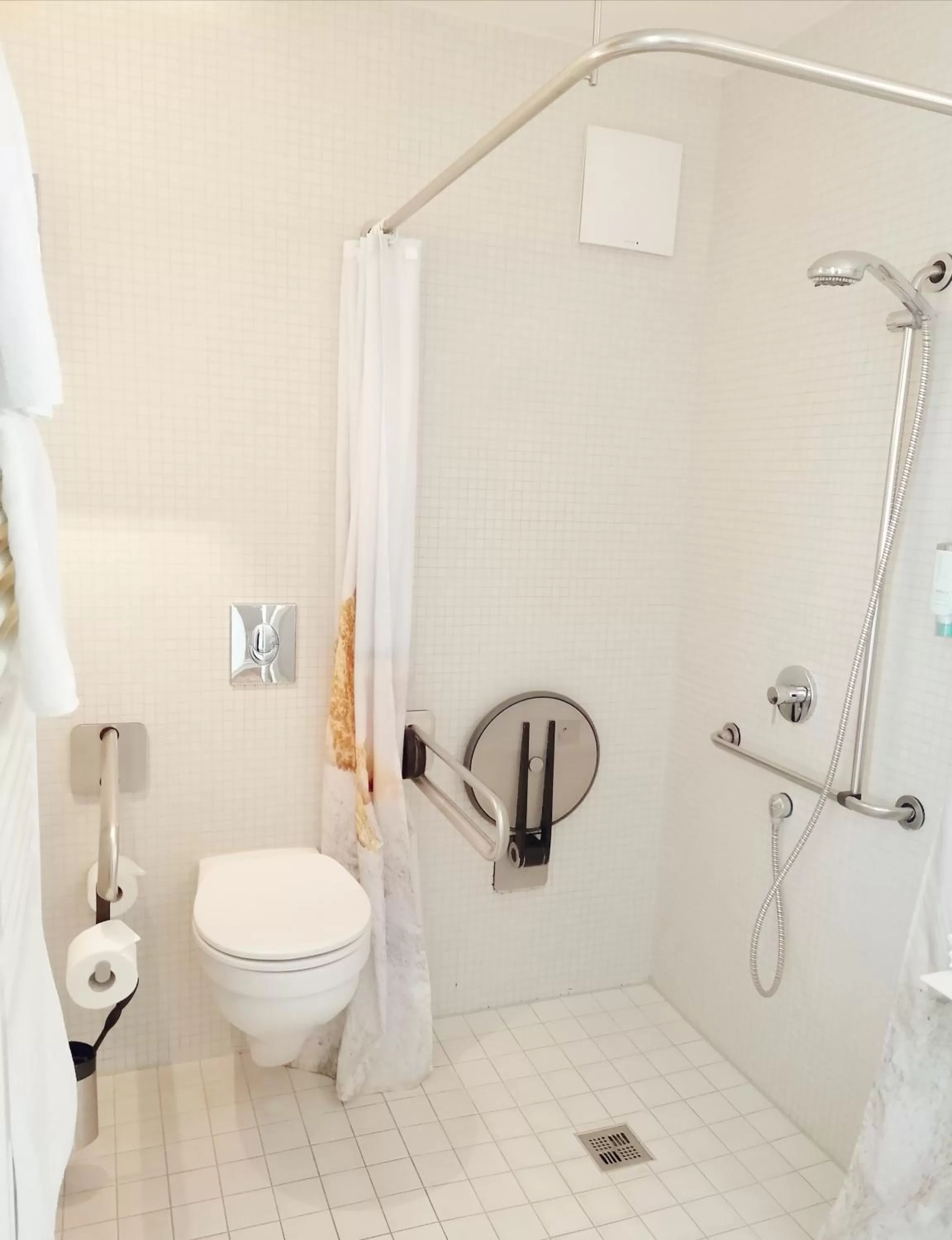 Shower in Nymphe Strandhotel & Apartments