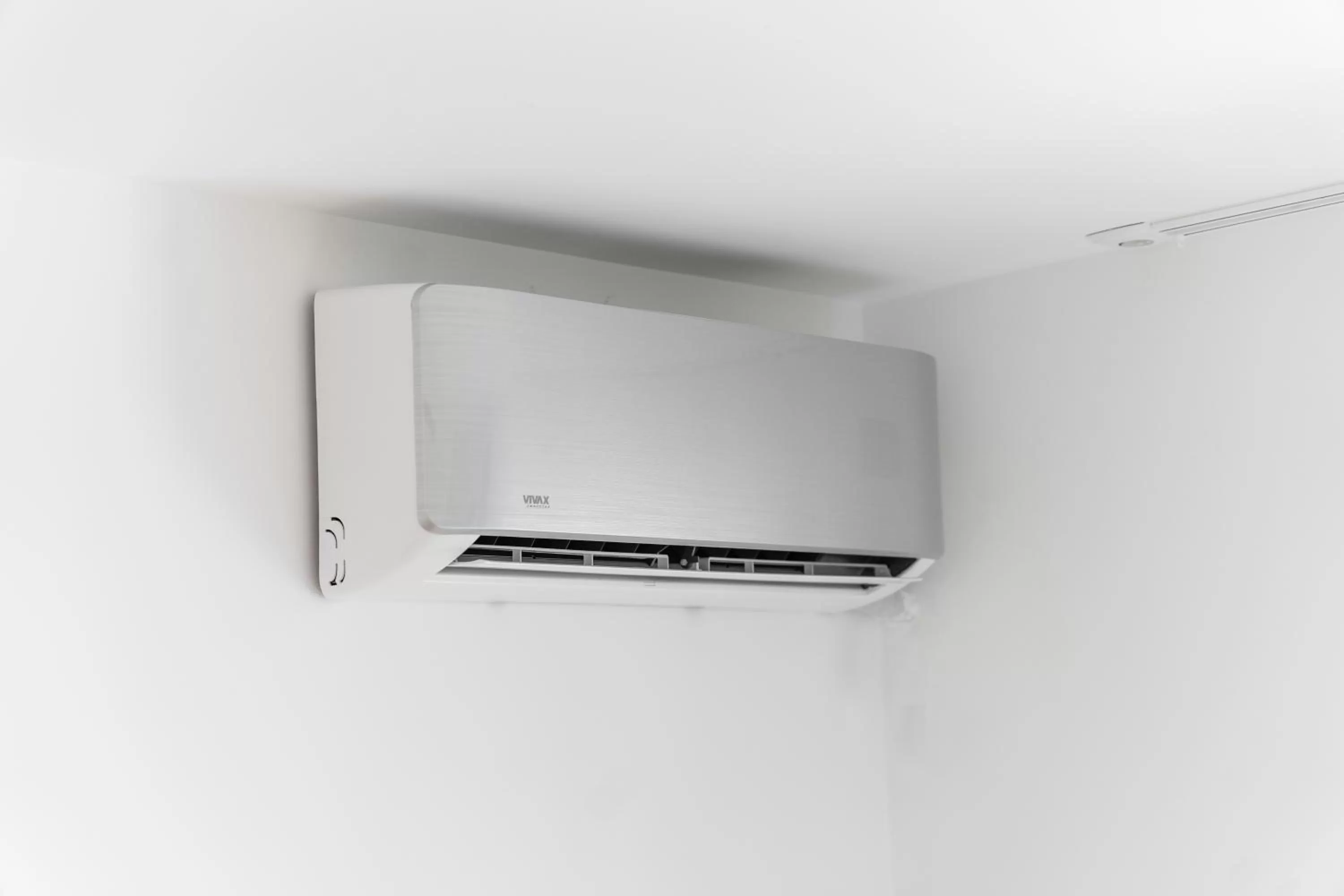 air conditioner, TV/Entertainment Center in The White Tree