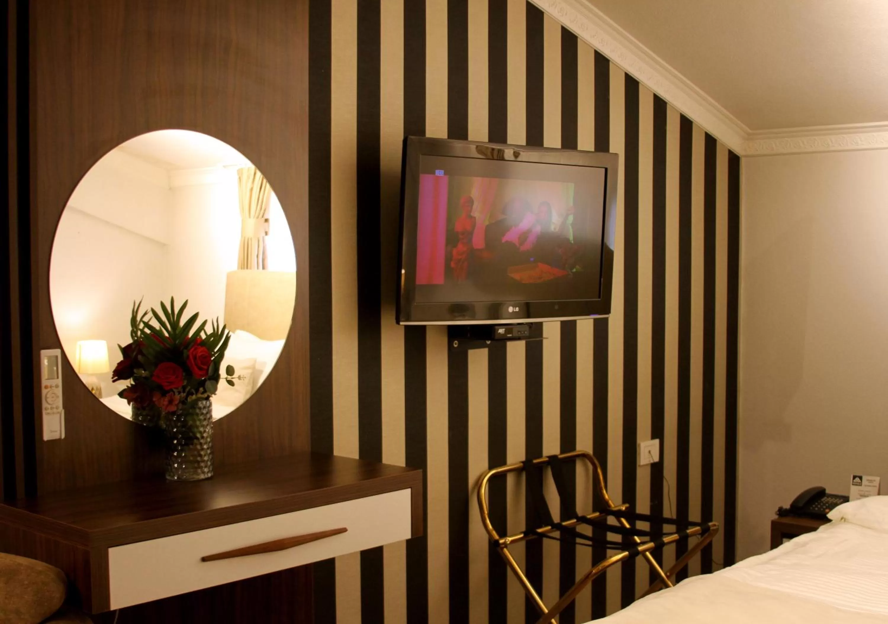 Bed, TV/Entertainment Center in Hotel Driada