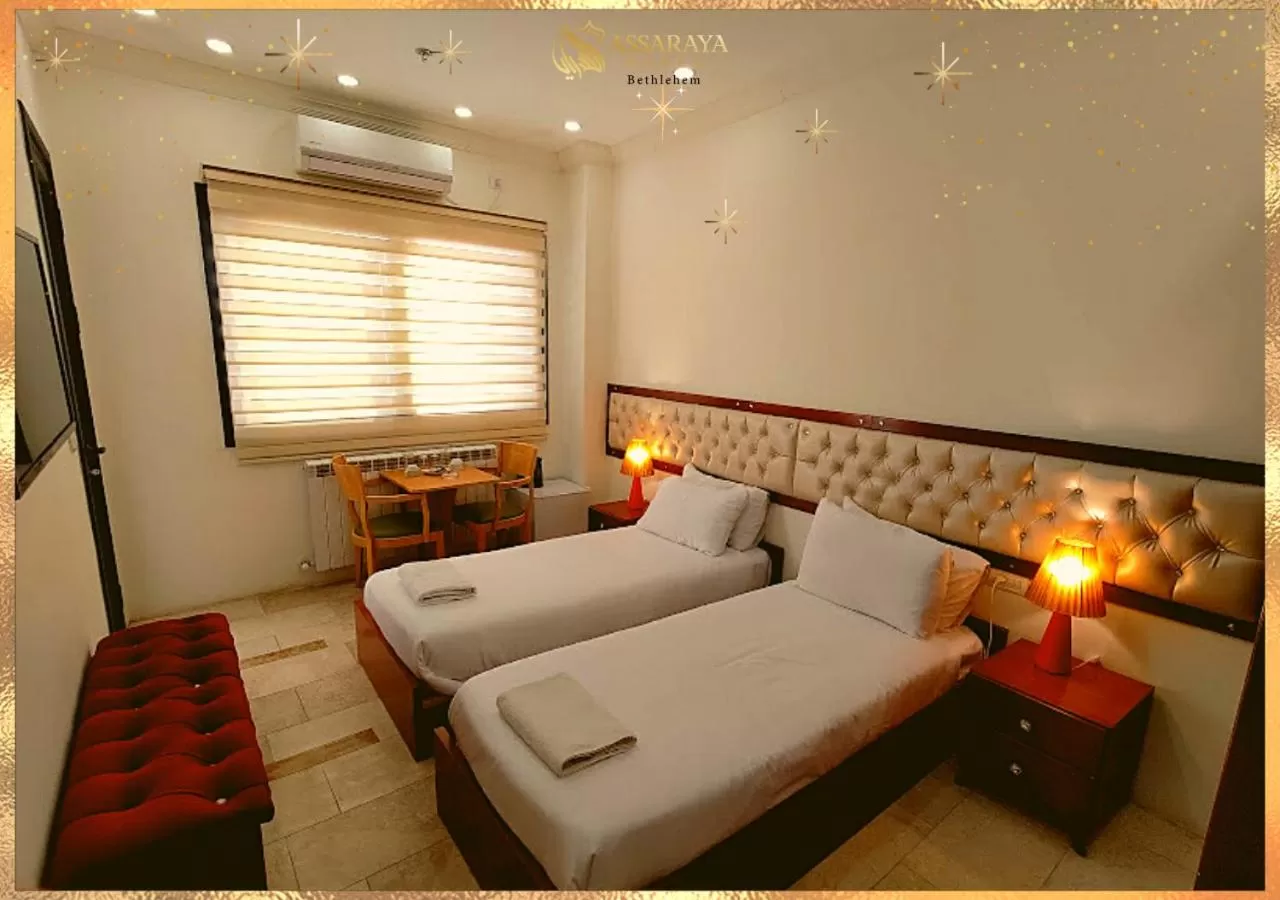 Bed in Assaraya Palace Hotel