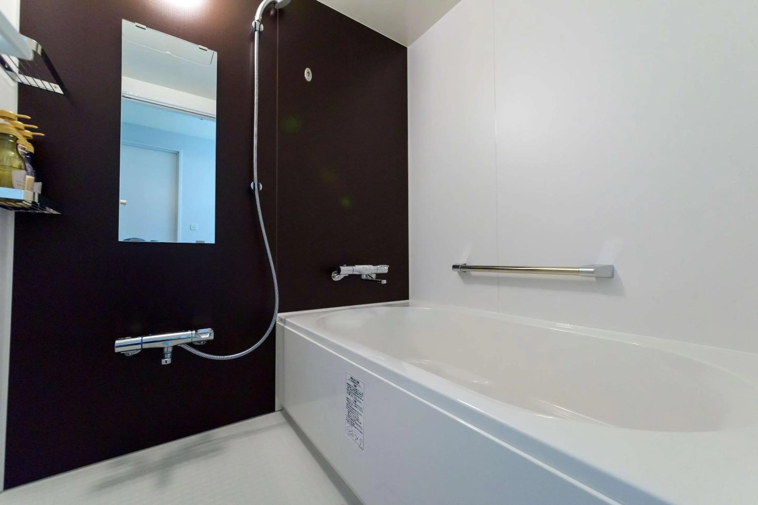 Bathroom in SureStay Plus Hotel by Best Western Shin-Osaka
